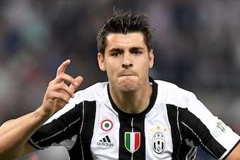 Juventus' forward from Spain Alvaro Morata celebrates after scoring during the Italian Tim Cup final football match AC Milan vs Juventus on May 21, 2016 at the Olympic Stadium in Rome.    AFP PHOTO / TIZIANA FABI / AFP / TIZIANA FABI        (Photo credit 