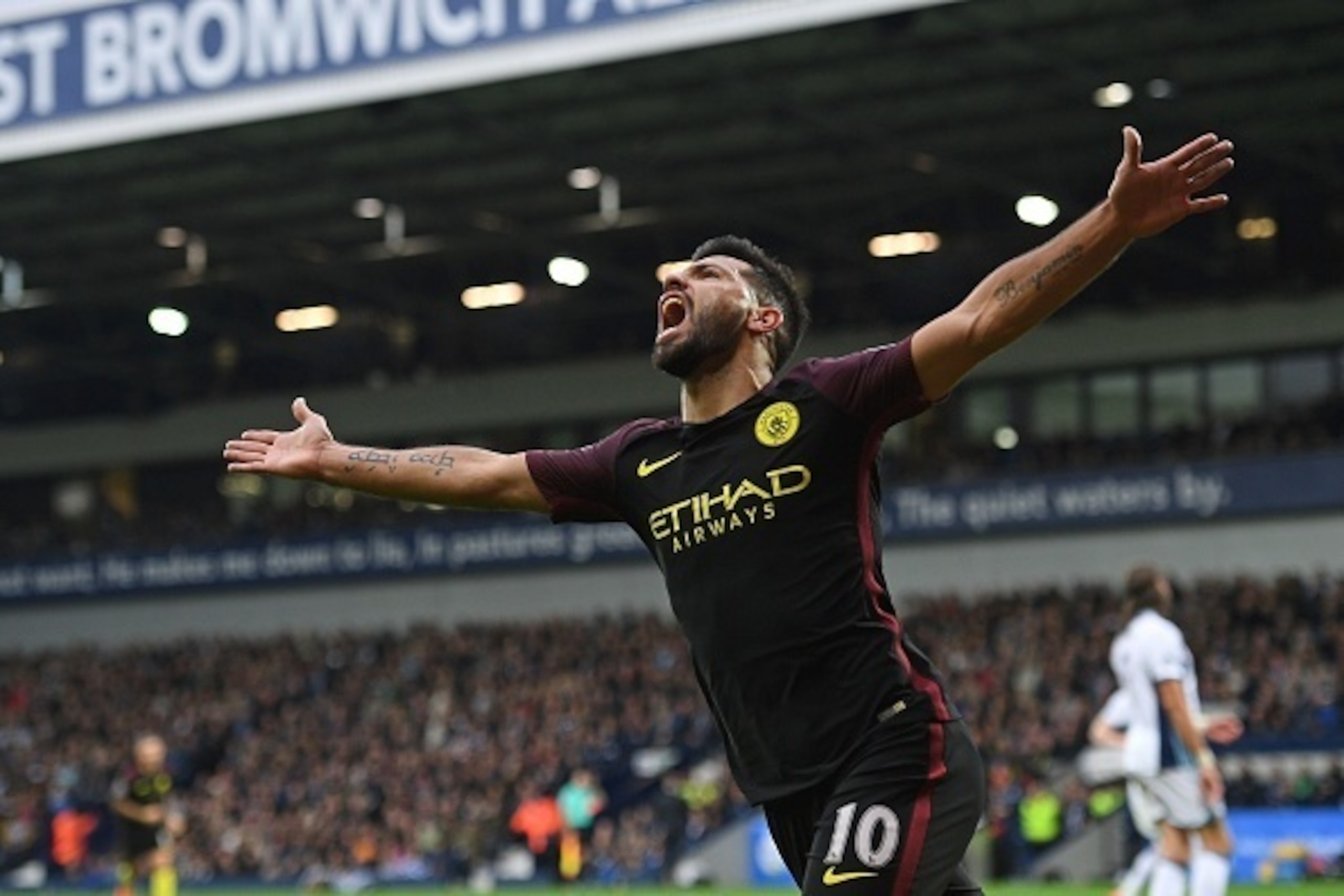 Manchester City's Argentinian striker Sergio Aguero celebrates after scoring the opening goal of the English Premier League football match between West Bromwich Albion and Manchester City at The Hawthorns stadium in West Bromwich, central England, on Octo Manchester City's Argentinian striker Sergio Aguero celebrates after scoring the opening goal of the English Premier League football match between West Bromwich Albion and Manchester City at The Hawthorns stadium in West Bromwich, central England, on Octo