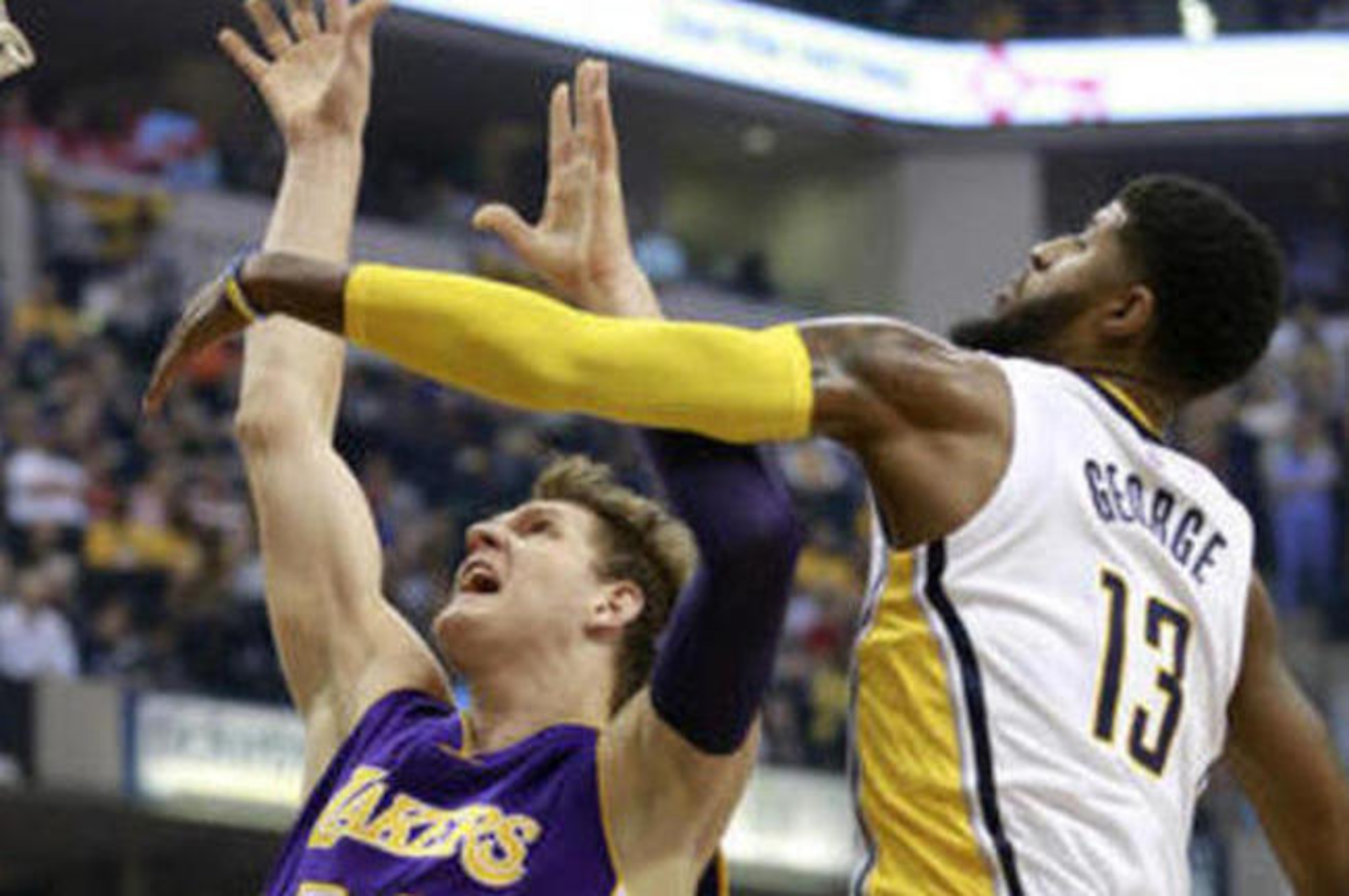 Timofey Mozgov going up against Paul George.