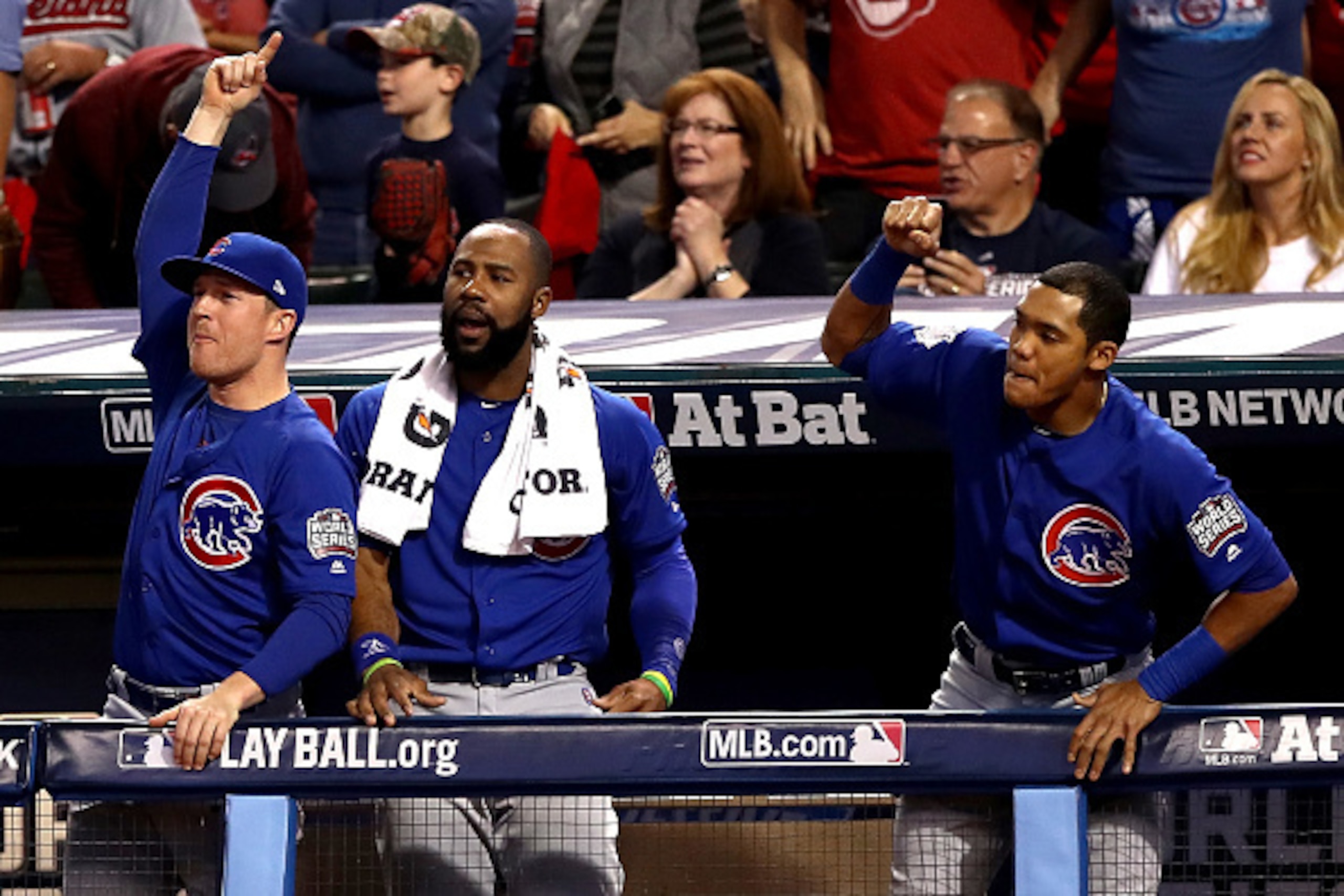CLEVELAND, OH - NOVEMBER 01:  Jason Heyward #22 of the Chicago Cubs (C) and Addison Russell #27 (R) react after Kris Bryant #17 (not pictured) hit a solo home run during the first inning against the Cleveland Indians in Game Six of the 2016 World Series a