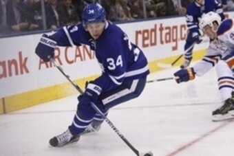 Nov 1, 2016; Toronto, Ontario, CAN;  Toronto Maple Leafs forward Auston Matthews (34) controls the puck against the Edmonton Oilers during the second period at Air Canada Centre. Mandatory Credit: John E. Sokolowski-USA TODAY Sports