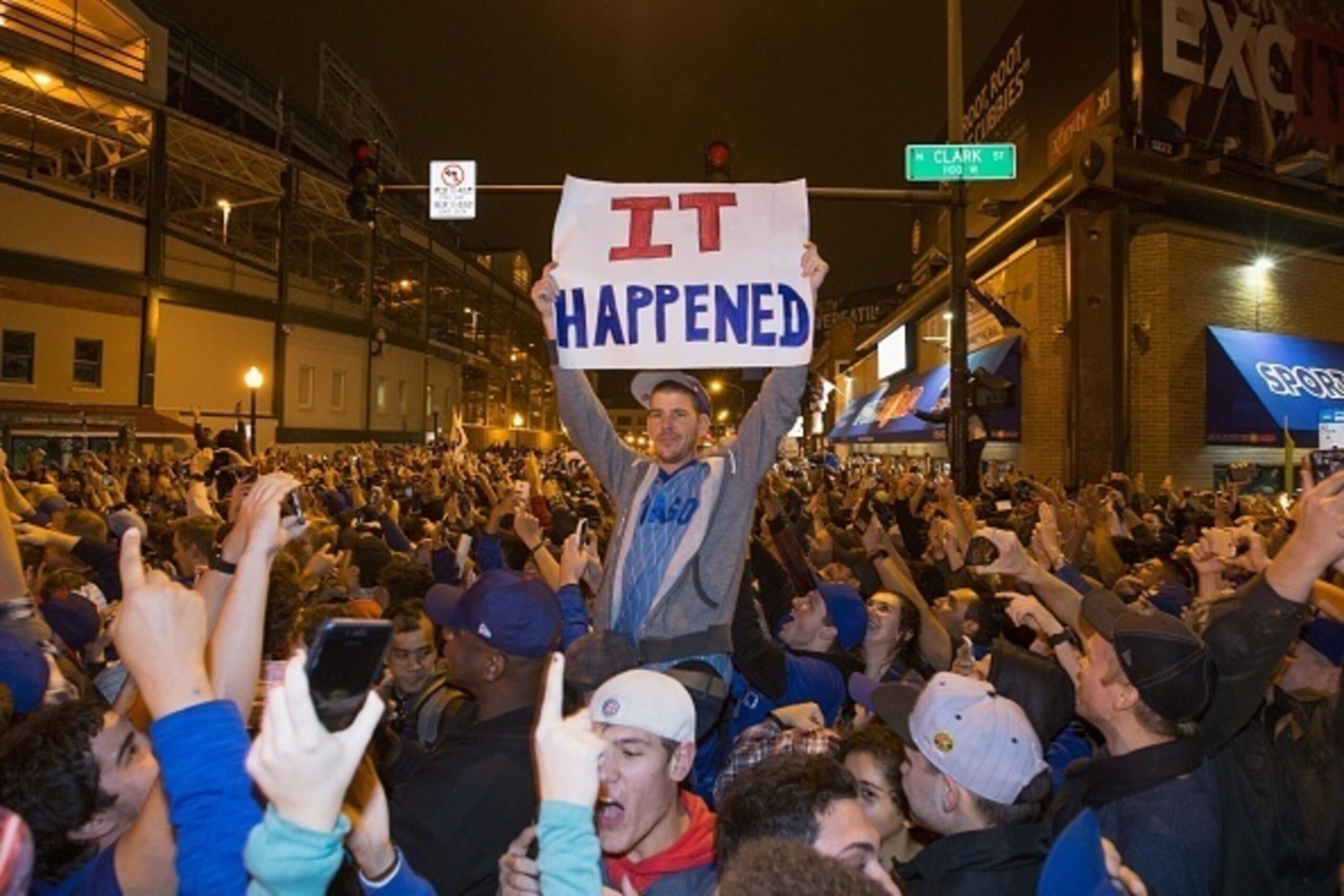 Chicago fans take to the streets to celebrate the Chicago Cubs 8-7 victory over the Cleveland Indians in Cleveland in 10th inning in game seven of the 2016 World Series, near Wrigley Field in Chicago, Illinois early on November 3, 2016.
Ending America's l
