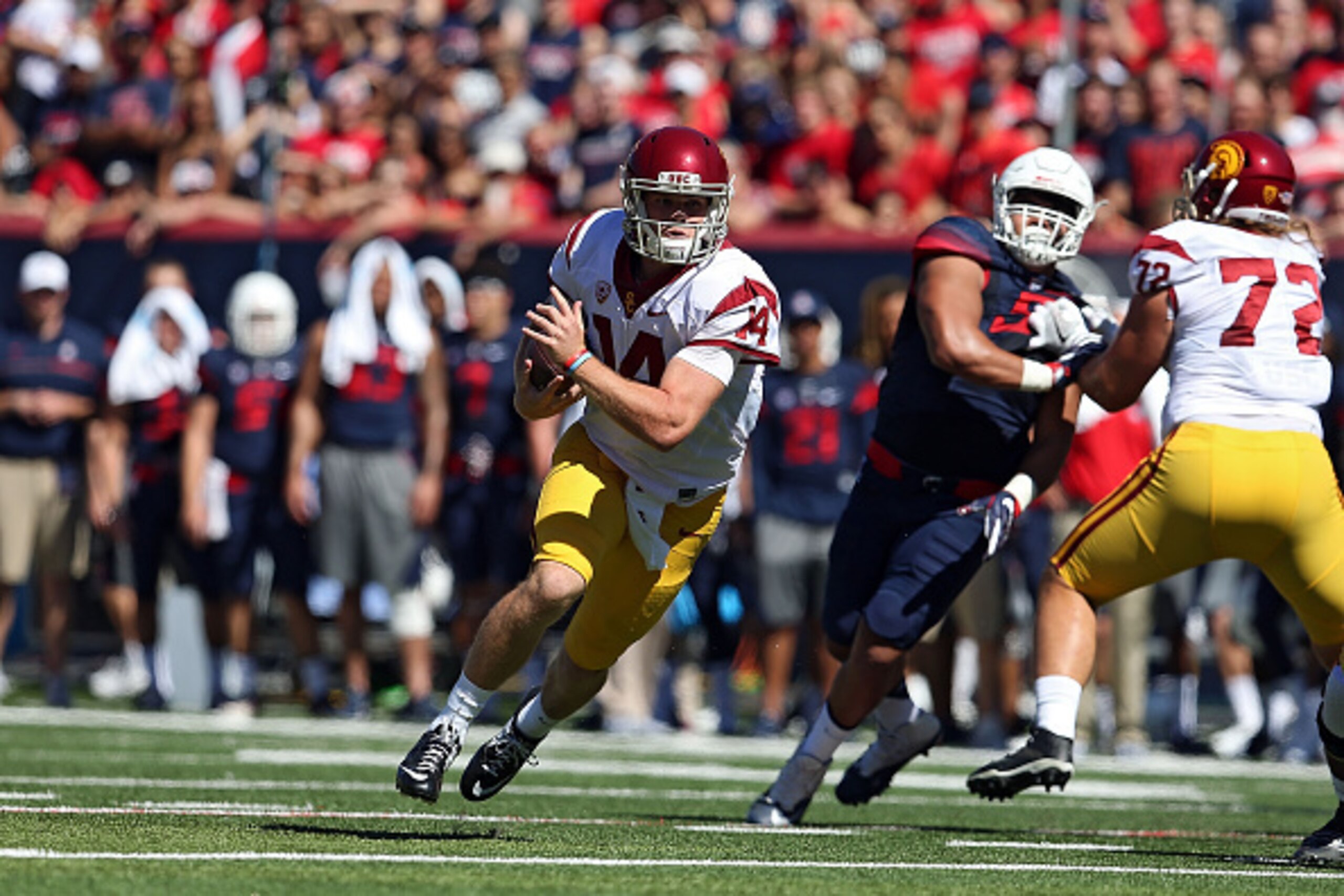 TUCSON, AZ - OCTOBER 15: Quarterback Sam Darnold #14 of the USC Trojans runs up field during the first quarter of the college football game against the Arizona Wildcats at Arizona Stadium on October 15, 2016 in Tucson, Arizona. (Photo by Chris Coduto/Gett