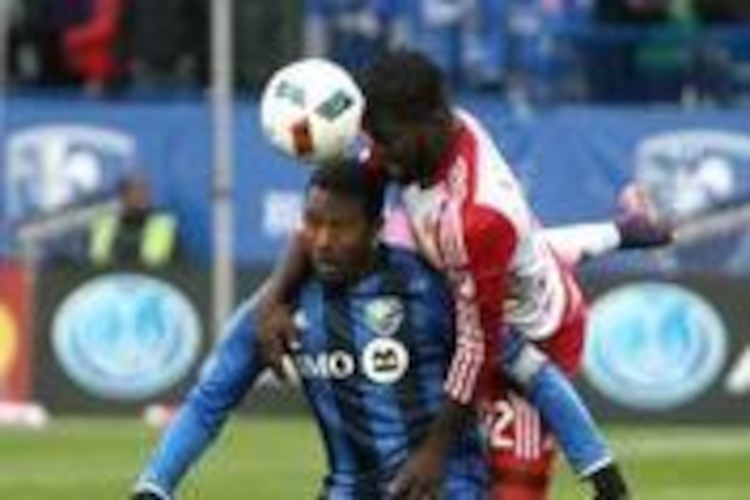 Oct 30, 2016; Montreal , Canada; Montreal Impact midfielder Patrice Bernier (8) heads the ball next to New York Red Bulls defender Kemar Lawrence (92) during the first half at Stade Saputo. Mandatory Credit: Jean-Yves Ahern-USA TODAY Sports Oct 30, 2016; Montreal , Canada; Montreal Impact midfielder Patrice Bernier (8) heads the ball next to New York Red Bulls defender Kemar Lawrence (92) during the first half at Stade Saputo. Mandatory Credit: Jean-Yves Ahern-USA TODAY Sports