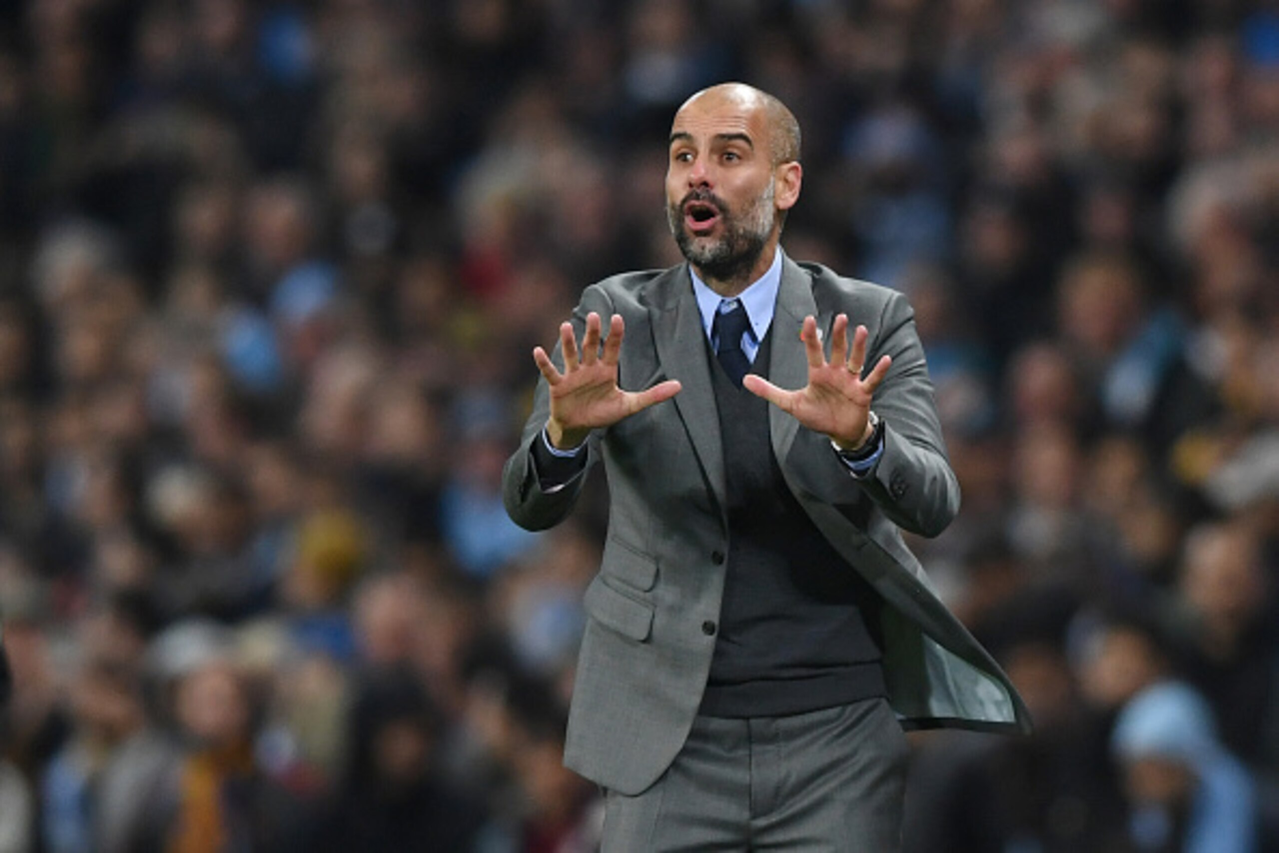 MANCHESTER, ENGLAND - NOVEMBER 01:  Josep Guardiola manager of Manchester City signals during the UEFA Champions League Group C match between Manchester City FC and FC Barcelona at Etihad Stadium on November 1, 2016 in Manchester, England.  (Photo by Shau
