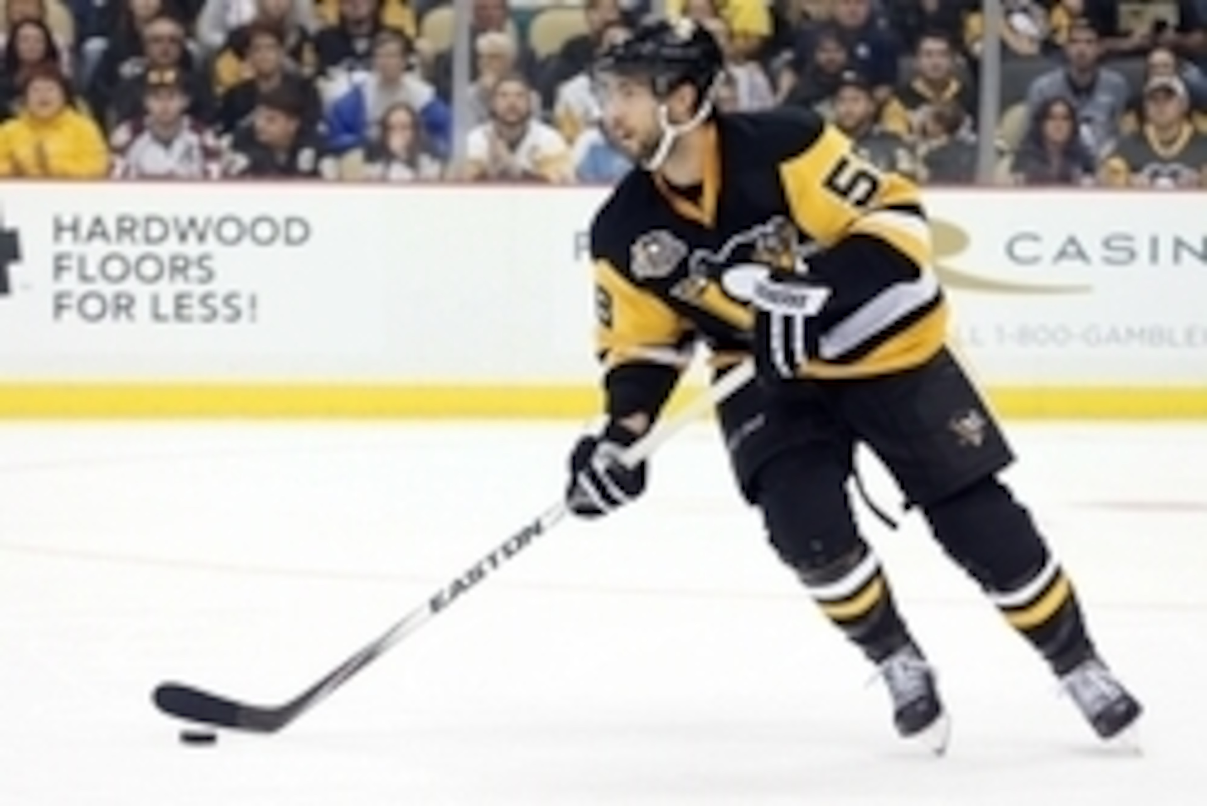 Oct 17, 2016; Pittsburgh, PA, USA;  Pittsburgh Penguins defenseman Kris Letang (58) handles the puck against the Colorado Avalanche during the second period at the PPG Paints Arena. The Avalanche won 4-3 in overtime. Mandatory Credit: Charles LeClaire-USA