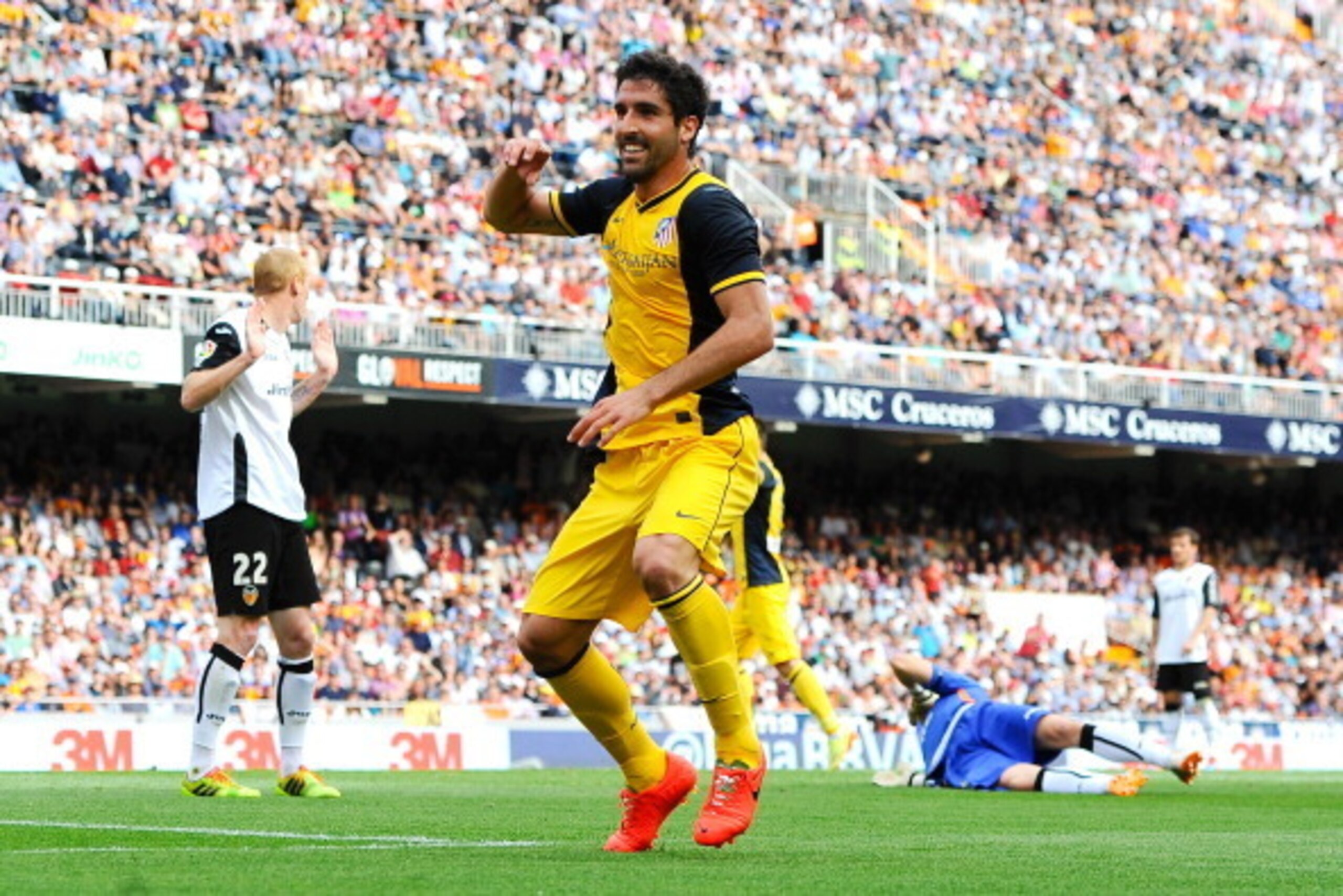VALENCIA, SPAIN - APRIL 27: Raul Garcia of Club Atletico de Madrid celebrates after scoring the opening goal during the La Liga match between Valencia CF and Club Atletico de Madrid at Estadio Mestalla on April 27, 2014 in Valencia, Spain. (Photo by Dav VALENCIA, SPAIN - APRIL 27: Raul Garcia of Club Atletico de Madrid celebrates after scoring the opening goal during the La Liga match between Valencia CF and Club Atletico de Madrid at Estadio Mestalla on April 27, 2014 in Valencia, Spain. (Photo by Dav
