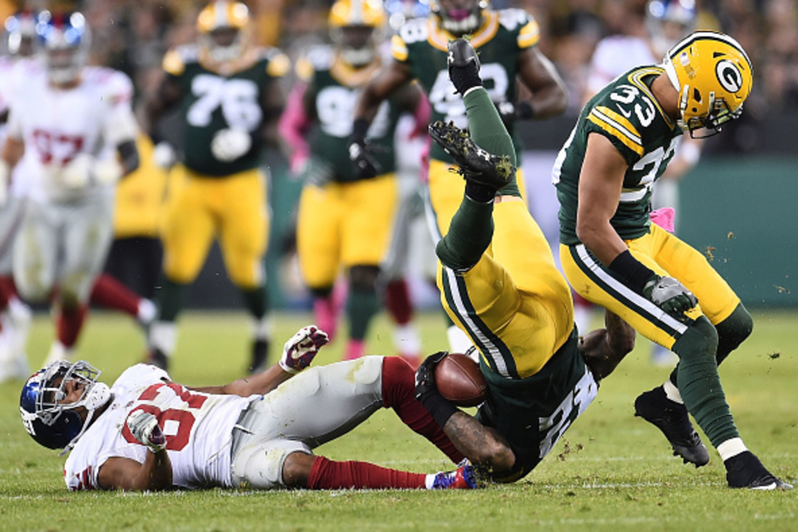 GREEN BAY, WI - OCTOBER 09:  Morgan Burnett #42 of the Green Bay Packers breaks up a pass intended for Sterling Shepard #87 of the New York Giants during the second half of a game at Lambeau Field on October 9, 2016 in Green Bay, Wisconsin.  The Packers d