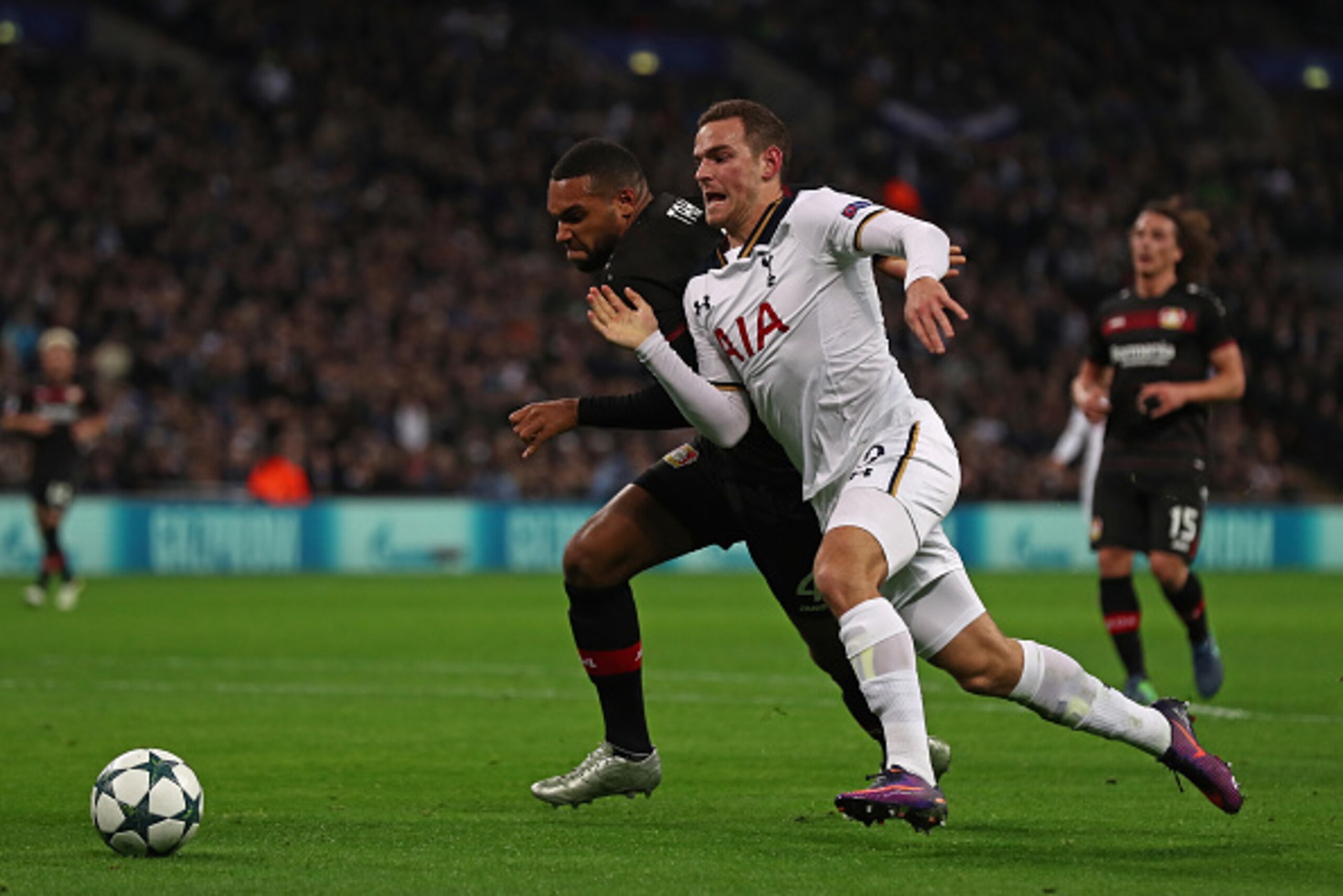 LONDON, ENGLAND - NOVEMBER 02: Jonathan Tah of Bayer Leverkusen holds off Vincent Janssen of Tottenham Hotspur during the UEFA Champions League Group E match between Tottenham Hotspur FC and Bayer 04 Leverkusen at Wembley Stadium on November 2, 2016 in Lo