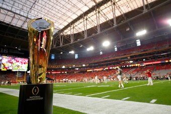 GLENDALE, AZ - JANUARY 11:  The College Football Playoff National Championship Trophy is seen on the field before the 2016 College Football Playoff National Championship Game between the Clemson Tigers and the Alabama Crimson Tide at University of Phoenix
