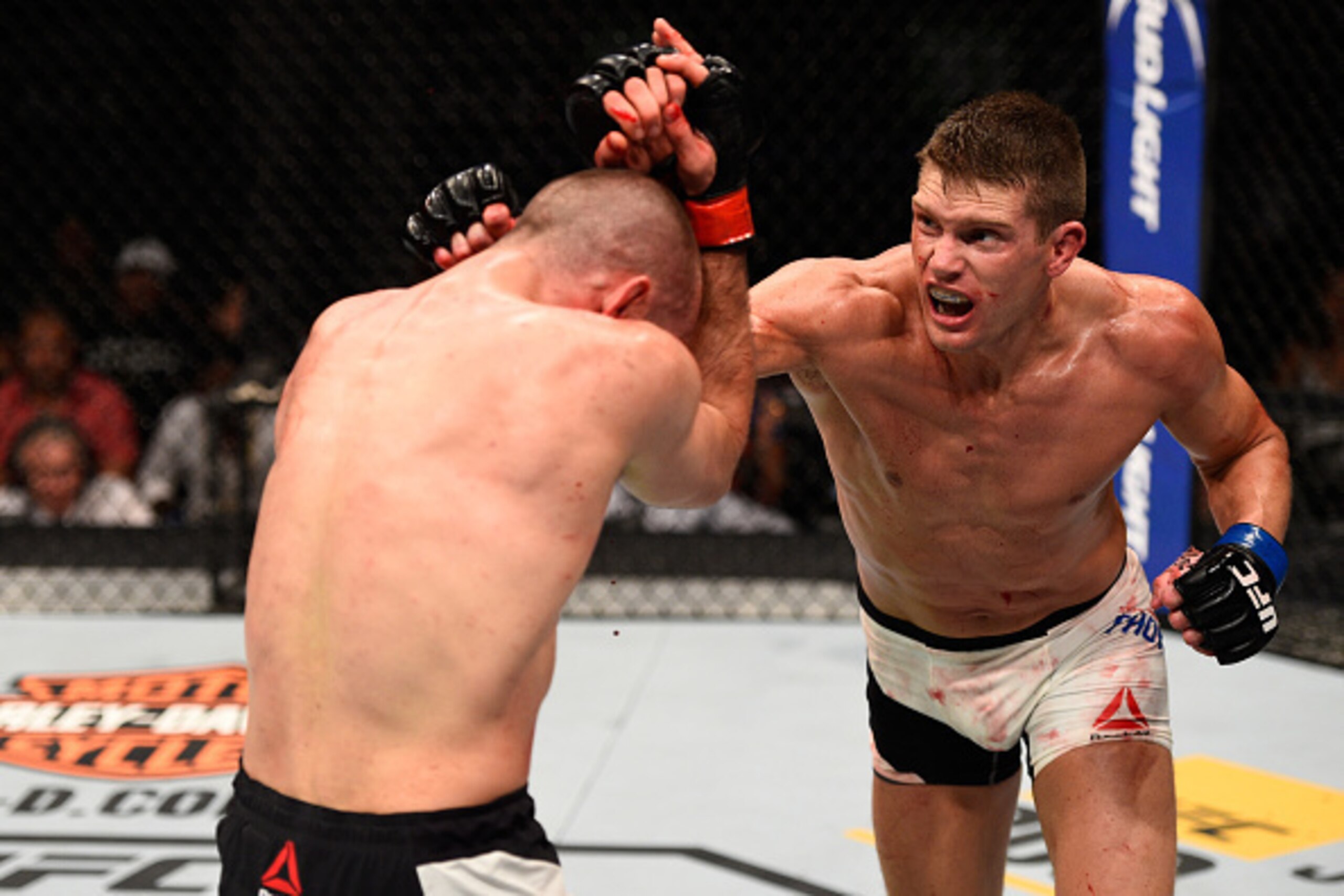 OTTAWA, ON - JUNE 18:   (R-L) Stephen Thompson of the United States punches Rory MacDonald of Canada in their welterweight bout during the UFC Fight Night event inside the TD Place Arena on June 18, 2016 in Ottawa, Ontario, Canada. (Photo by Jeff Bottari/