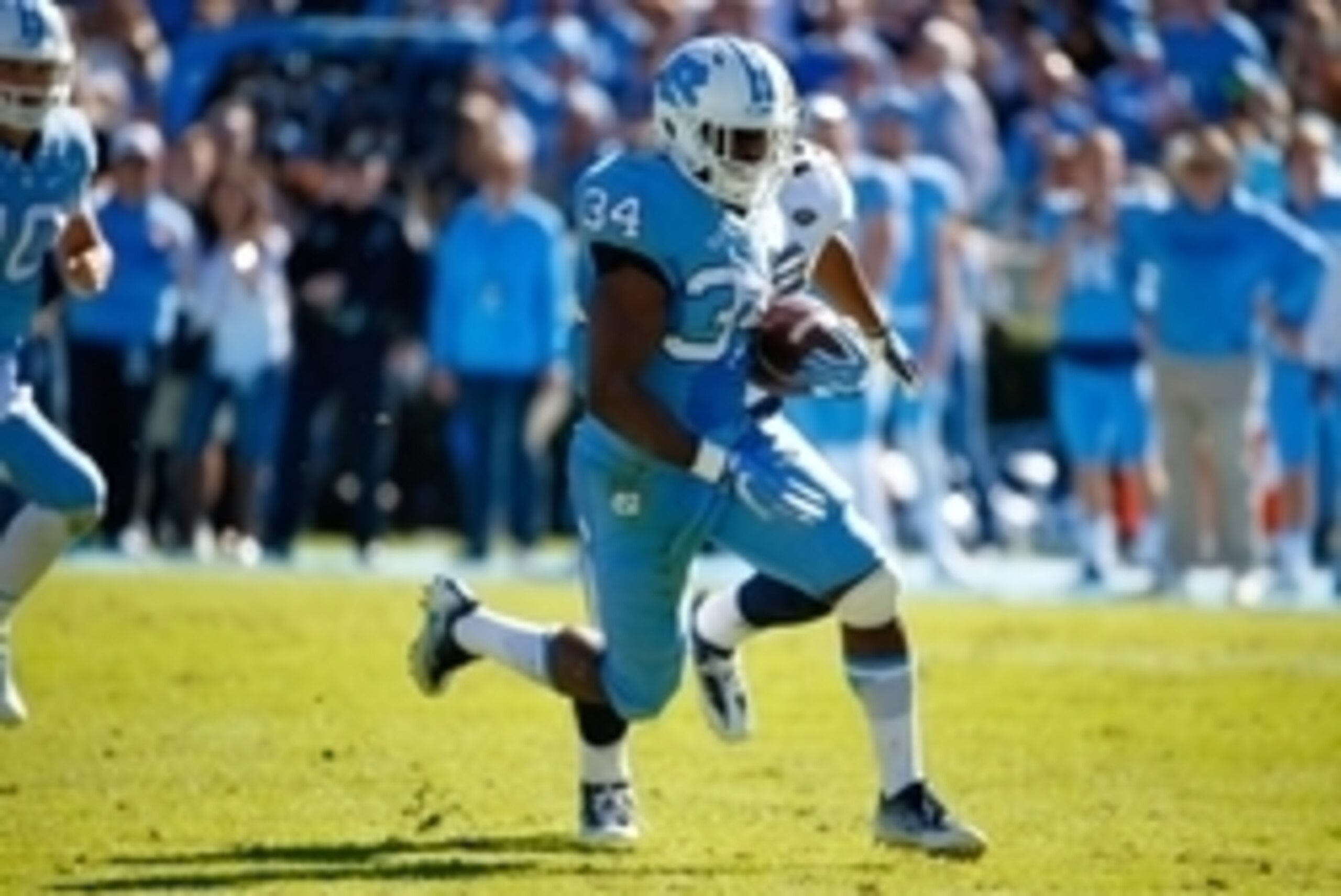 Nov 5, 2016; Chapel Hill, NC, USA; North Carolina Tar Heels running back Elijah Hood (34) runs for a first quarter touchdown against the Georgia Tech Yellow Jackets at Kenan Memorial Stadium. Mandatory Credit: James Guillory-USA TODAY Sports Nov 5, 2016; Chapel Hill, NC, USA; North Carolina Tar Heels running back Elijah Hood (34) runs for a first quarter touchdown against the Georgia Tech Yellow Jackets at Kenan Memorial Stadium. Mandatory Credit: James Guillory-USA TODAY Sports
