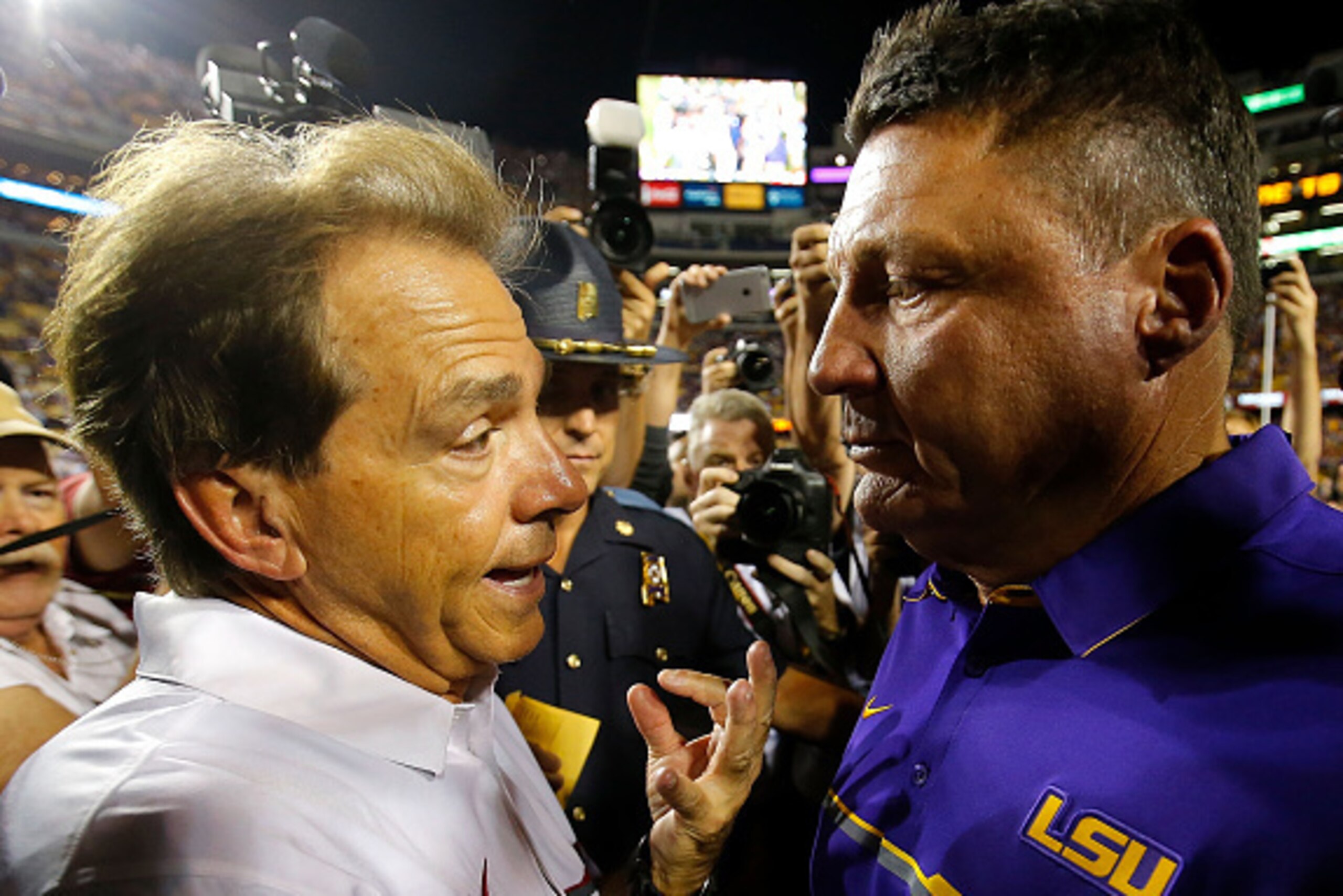 BATON ROUGE, LA - NOVEMBER 05:  Head coach Nick Saban of the Alabama Crimson Tide shakes hands with head coach Ed Orgeron of the LSU Tigers after their 10-0 win at Tiger Stadium on November 5, 2016 in Baton Rouge, Louisiana.  (Photo by Kevin C. Cox/Getty 