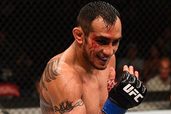SAN DIEGO, CA - JULY 15:  Tony Ferguson taunts Josh Thomson in their lightweight bout during the UFC event at the Valley View Casino Center on July 15, 2015 in San Diego, California. (Photo by Jeff Bottari/Zuffa LLC/Zuffa LLC via Getty Images)