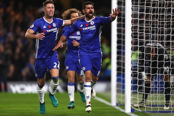 LONDON, ENGLAND - NOVEMBER 05: Diego Costa of Chelsea (R) celebrates scoring his sides third goal with Gary Cahill of Chelsea (L) during the Premier League match between Chelsea and Everton at Stamford Bridge on November 5, 2016 in London, England.  (Phot