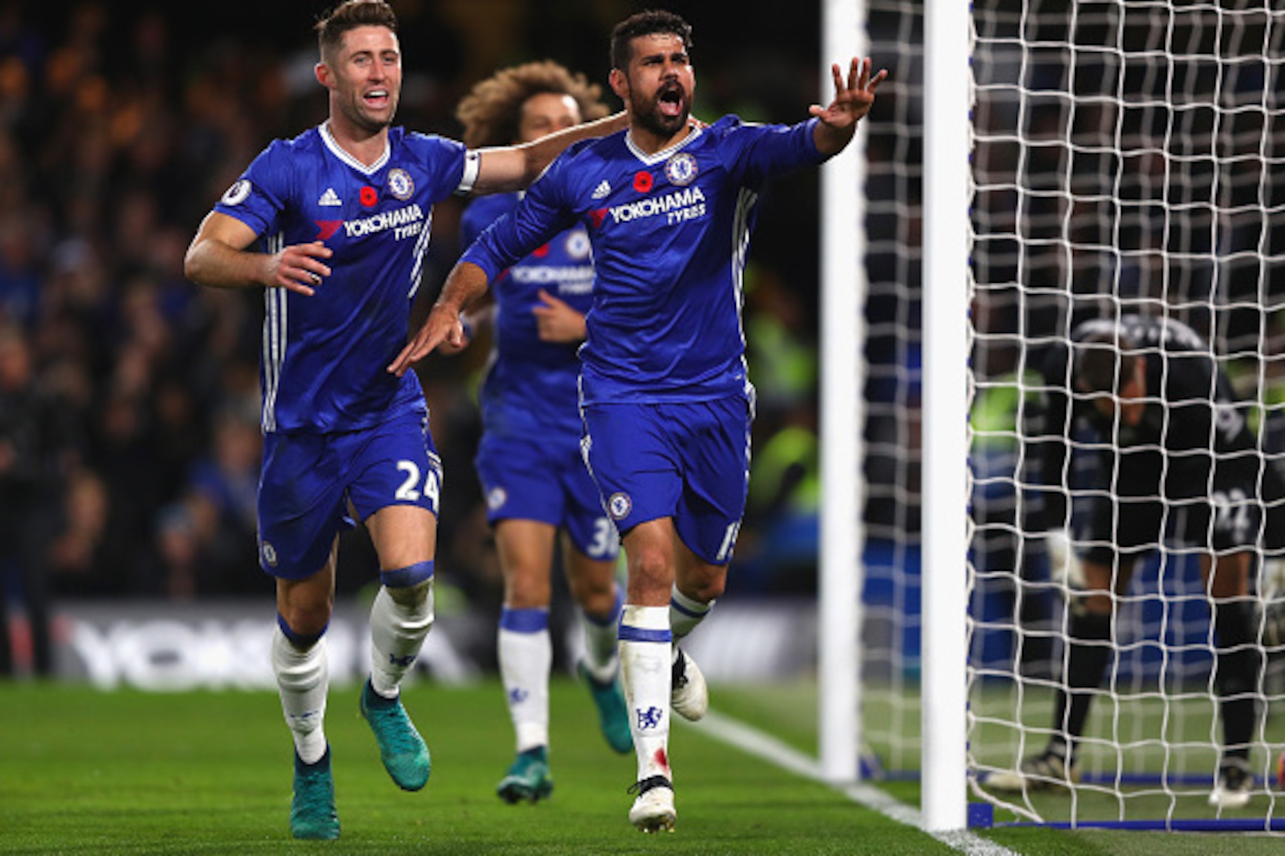 LONDON, ENGLAND - NOVEMBER 05: Diego Costa of Chelsea (R) celebrates scoring his sides third goal with Gary Cahill of Chelsea (L) during the Premier League match between Chelsea and Everton at Stamford Bridge on November 5, 2016 in London, England.  (Phot