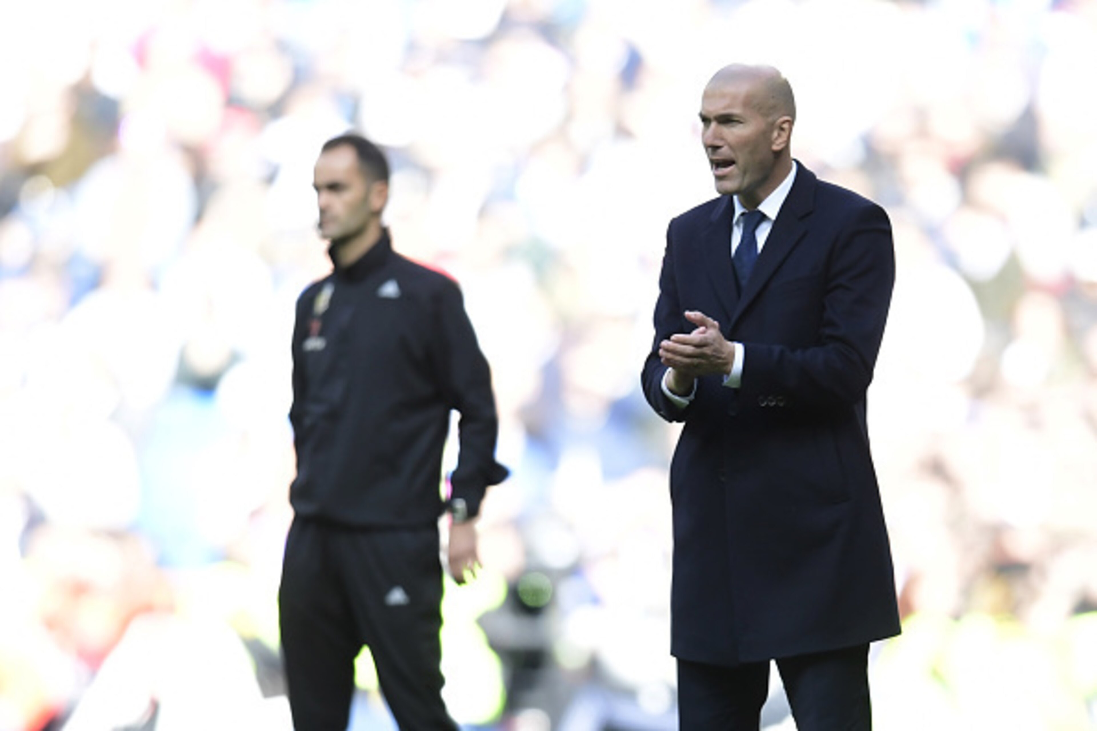 Real Madrid's French coach Zinedine Zidane gestures during the Spanish league football match Real Madrid CF vs Club Deportivo Leganes SAD at the Santiago Bernabeu stadium in Madrid  on November 6, 2016. / AFP / JAVIER SORIANO        (Photo credit should r