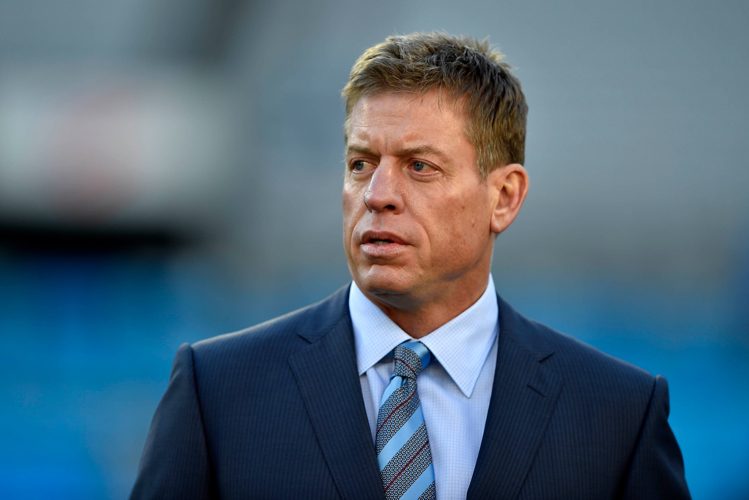 Jan 24, 2016; Charlotte, NC, USA; Fox Sports analyst Troy Aikman on the field before the game between the Carolina Panthers and the Arizona Cardinals in the NFC Championship football game at Bank of America Stadium. Mandatory Credit: Bob Donnan-USA TODAY