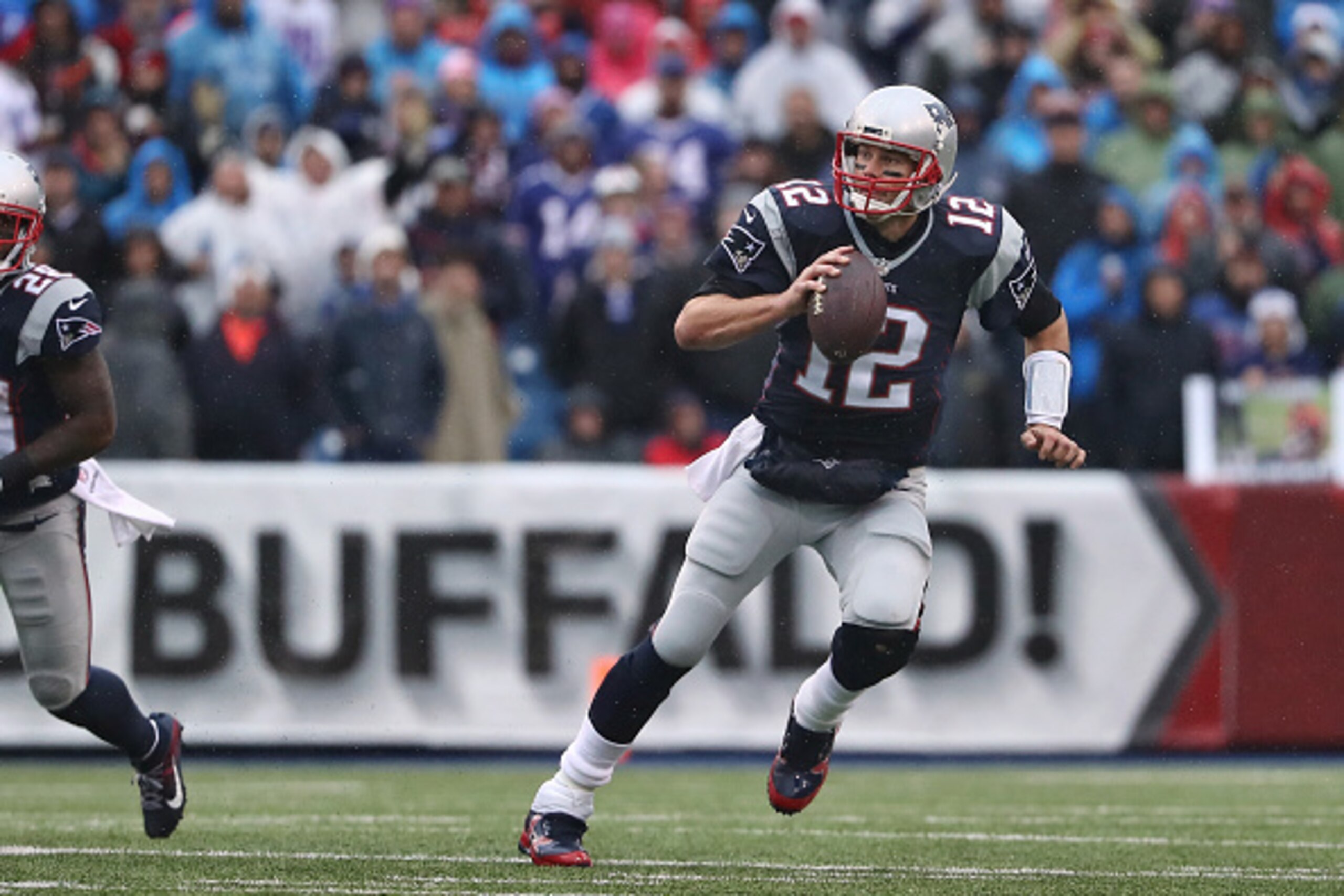 ORCHARD PARK, NY - OCTOBER 30: Tom Brady #12 of the New England Patriots scrambles as he runs with the ball during NFL game action against the Buffalo Bills at New Era Field on October 30, 2016 in Orchard Park, New York. (Photo by Tom Szczerbowski/Getty I