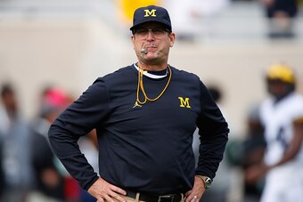EAST LANSING, MI - OCTOBER 29: Head coach Jim Harbaugh of the Michigan Wolverines looks on during warm ups prior to playing the Michigan State Spartans at Spartan Stadium on October 29, 2016 in East Lansing, Michigan. (Photo by Gregory Shamus/Getty Images