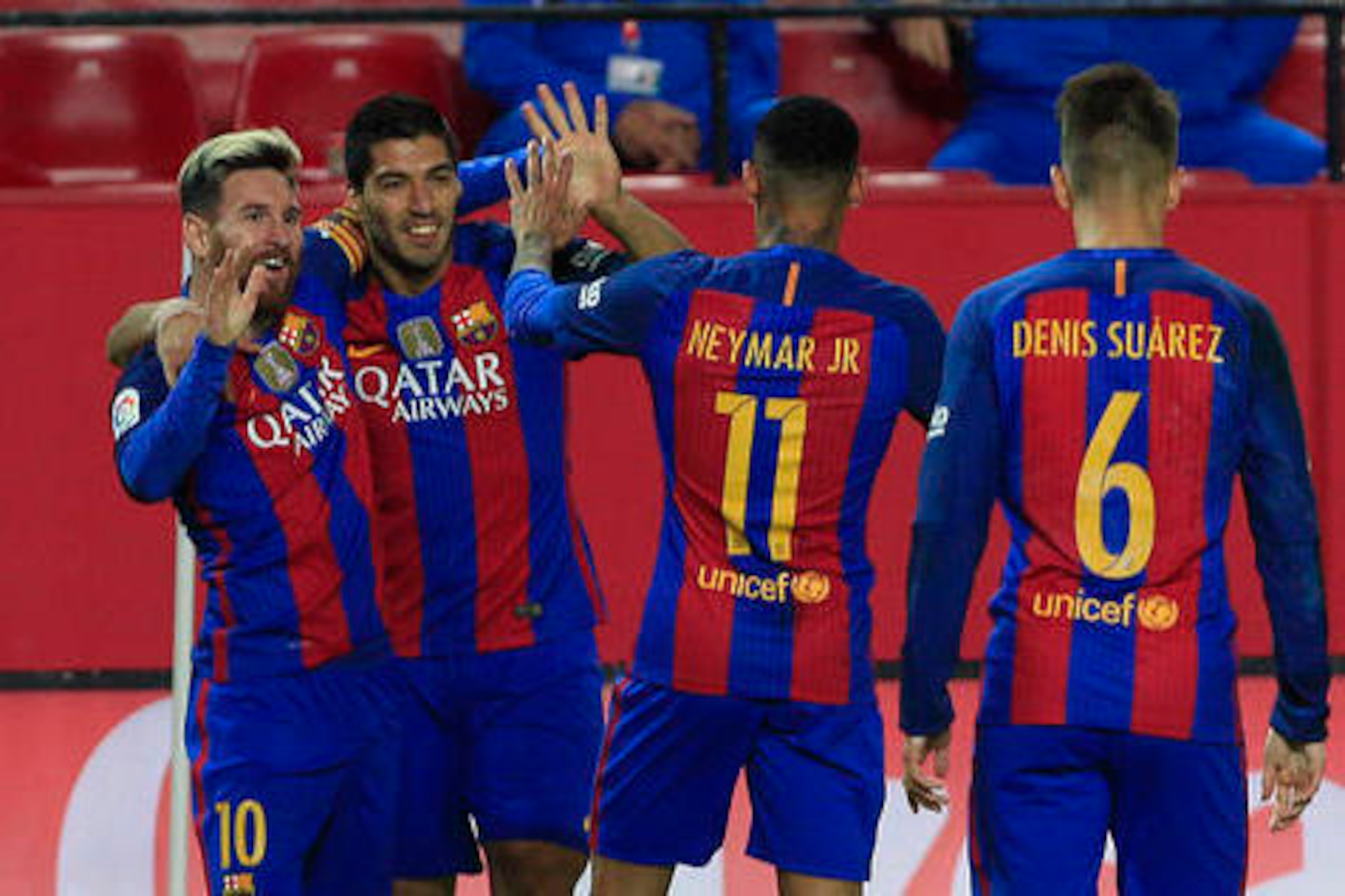 Messi celebrates with Luis Suarez, Neymar and Denis Suarez.