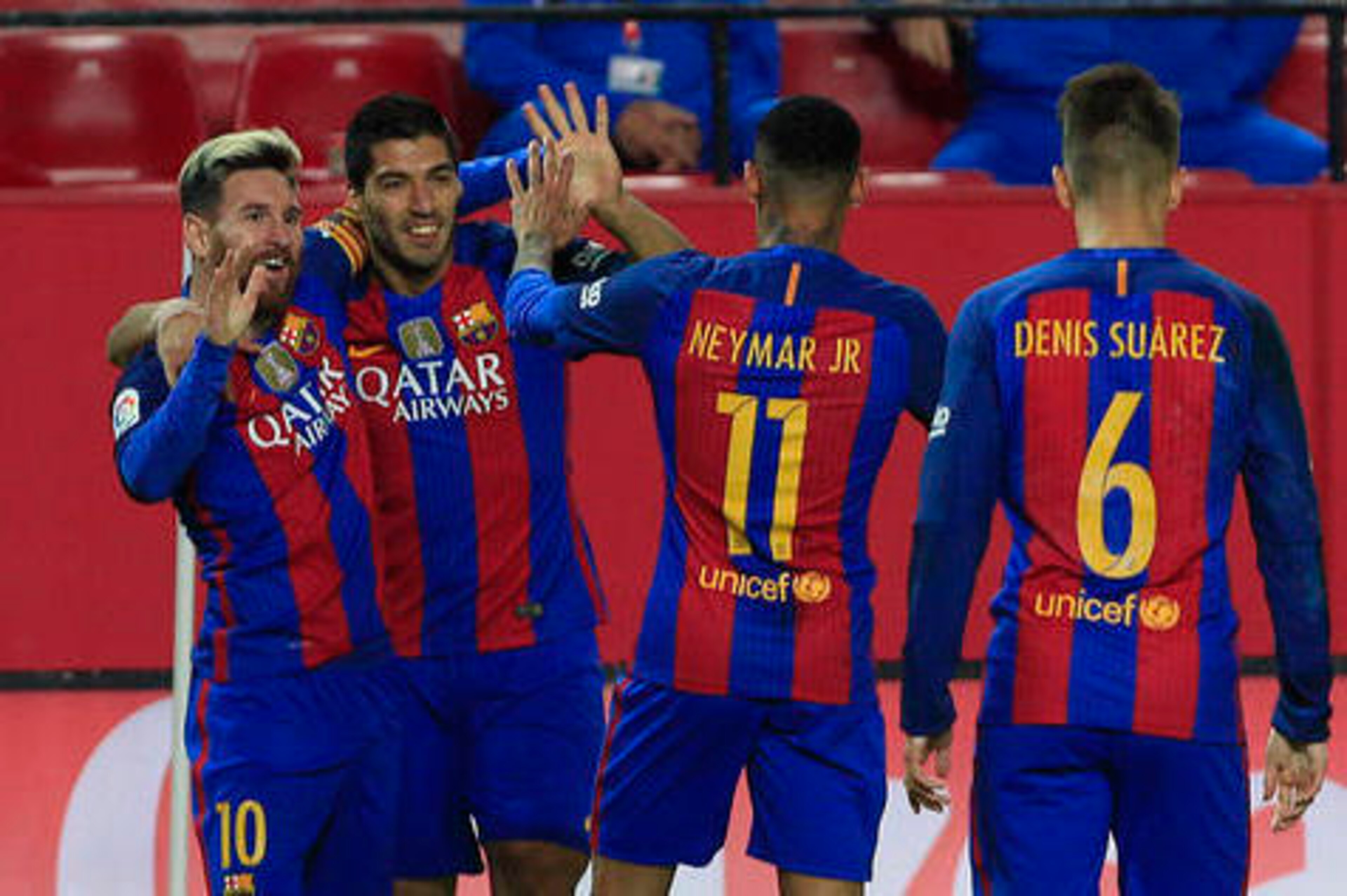 Messi celebrates with Luis Suarez, Neymar and Denis Suarez.