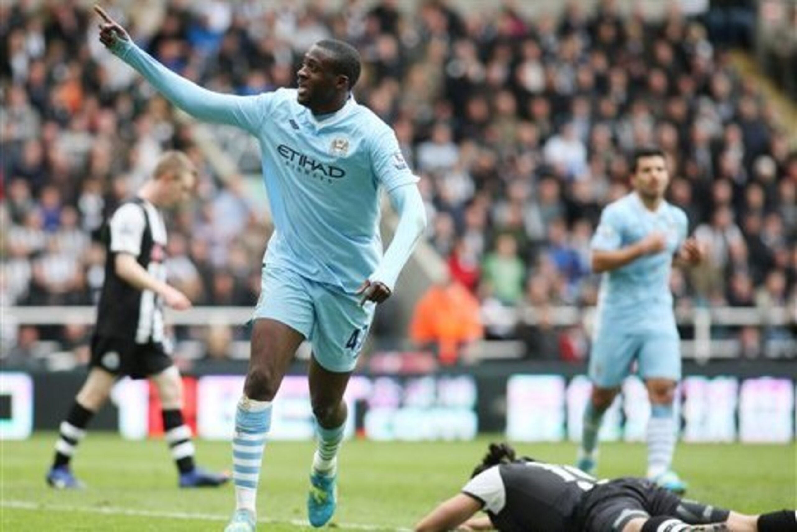Toure's brace at Newcastle left City top of the table with one game to go in 2012.