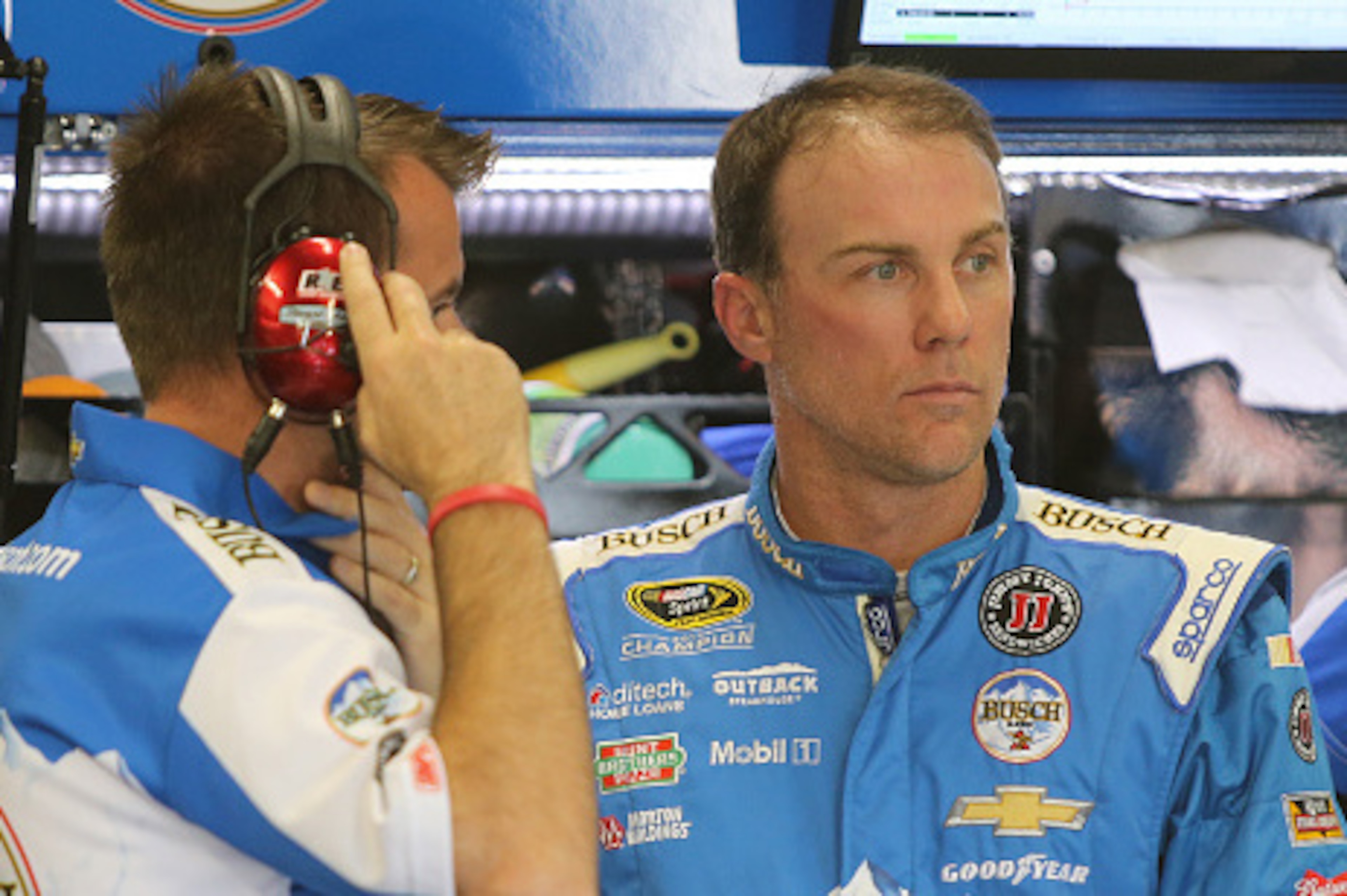 FORT WORTH, TX - NOVEMBER 04:  Kevin Harvick, driver of the #4 Busch Beer Chevrolet, stands in the garage area during practice for the NASCAR Sprint Cup Series AAA Texas 500 at Texas Motor Speedway on November 4, 2016 in Fort Worth, Texas.  (Photo by Jerr