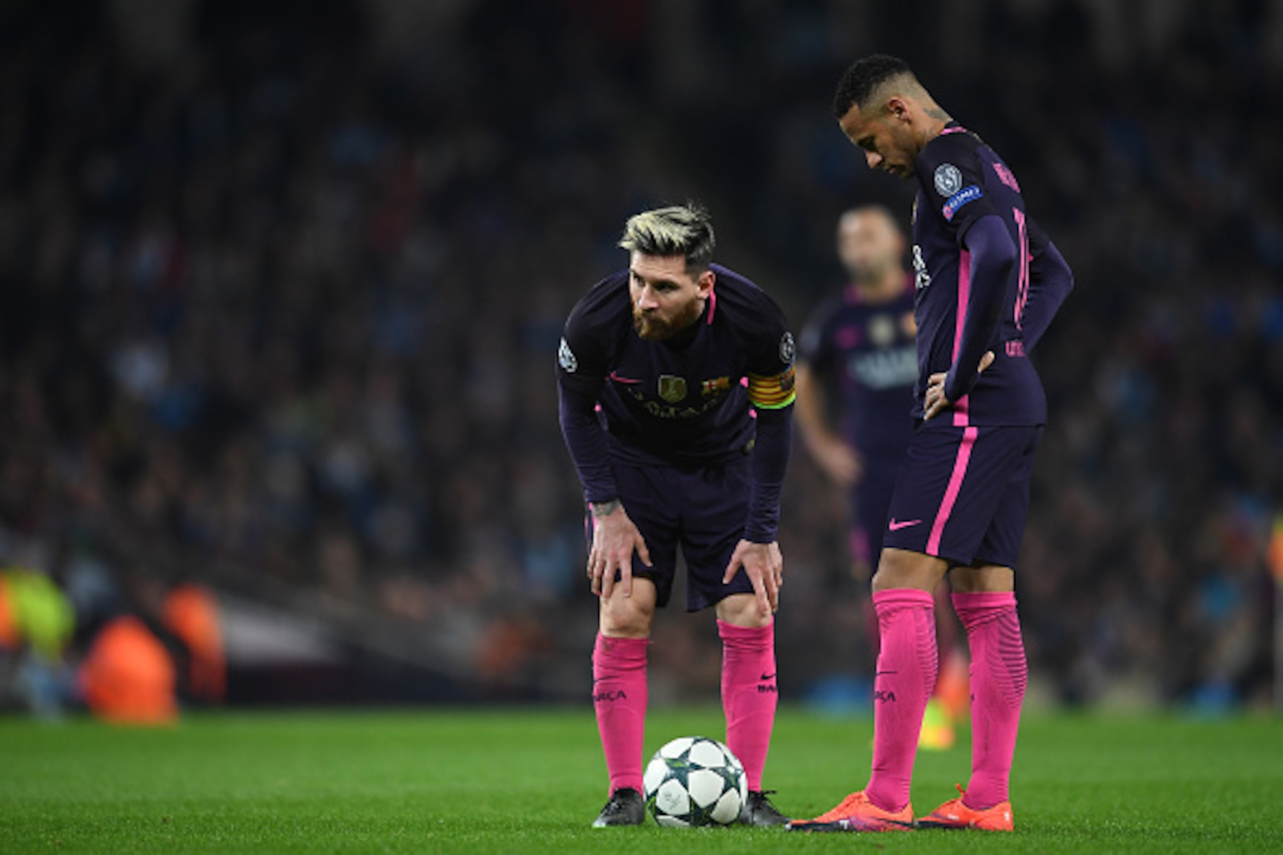 MANCHESTER, ENGLAND - NOVEMBER 01: Lionel Messi of Barcelona (L) and Neymar of Barcelona (R) are dejected after Manchester City score their third goal during the UEFA Champions League Group C match between Manchester City FC and FC Barcelona at Etihad Sta