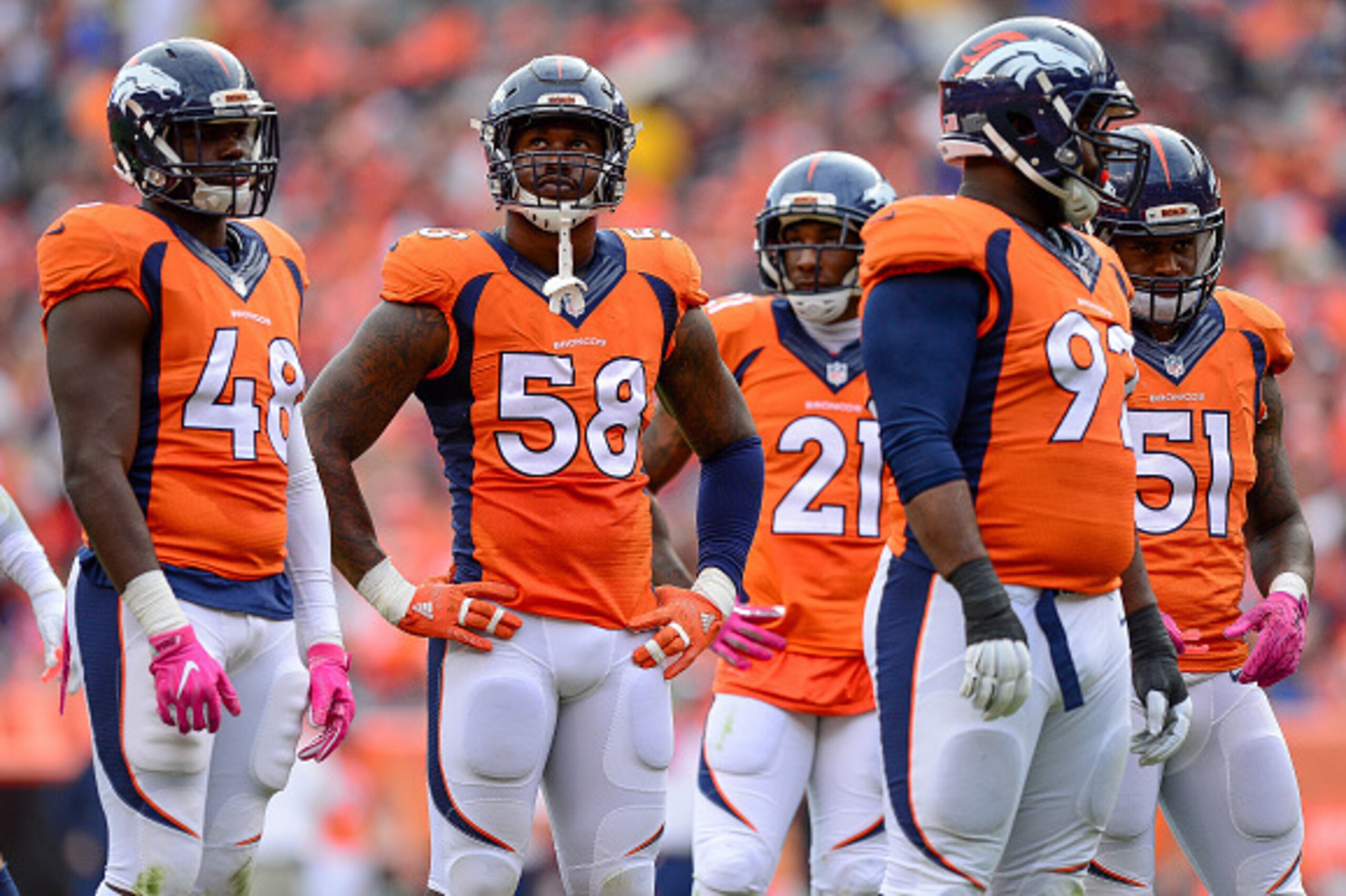 DENVER, CO - OCTOBER 9:  Denver Broncos defensive players, including Von Miller #58, look on during a break in the action during a game Atlanta Falcons at Sports Authority Field at Mile High on October 9, 2016 in Denver, Colorado. (Photo by Dustin Bradfor