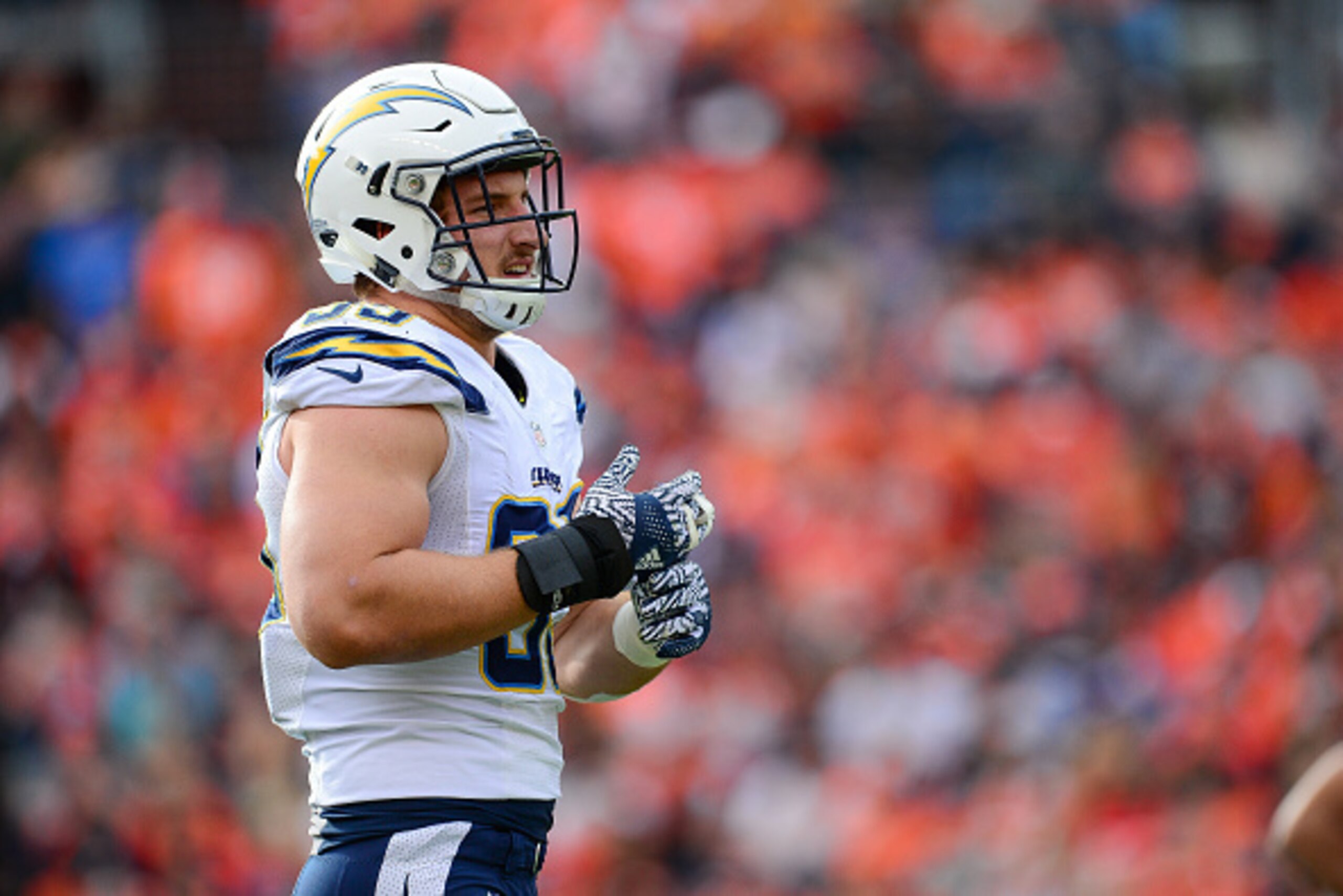 DENVER, CO - OCTOBER 30:  Defensive end Joey Bosa #99 of the San Diego Chargers looks on in the second quarter of a game against the Denver Broncos at Sports Authority Field at Mile High on October 30, 2016 in Denver, Colorado. (Photo by Dustin Bradford/G