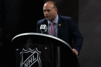 NEWARK, NJ - JUNE 30:  Vice President and General Manager Stan Bowman of the Chicago Blackhawks speaks at the podium during the 2013 NHL Draft at the Prudential Center on June 30, 2013 in Newark, New Jersey.  (Photo by Bruce Bennett/Getty Images)