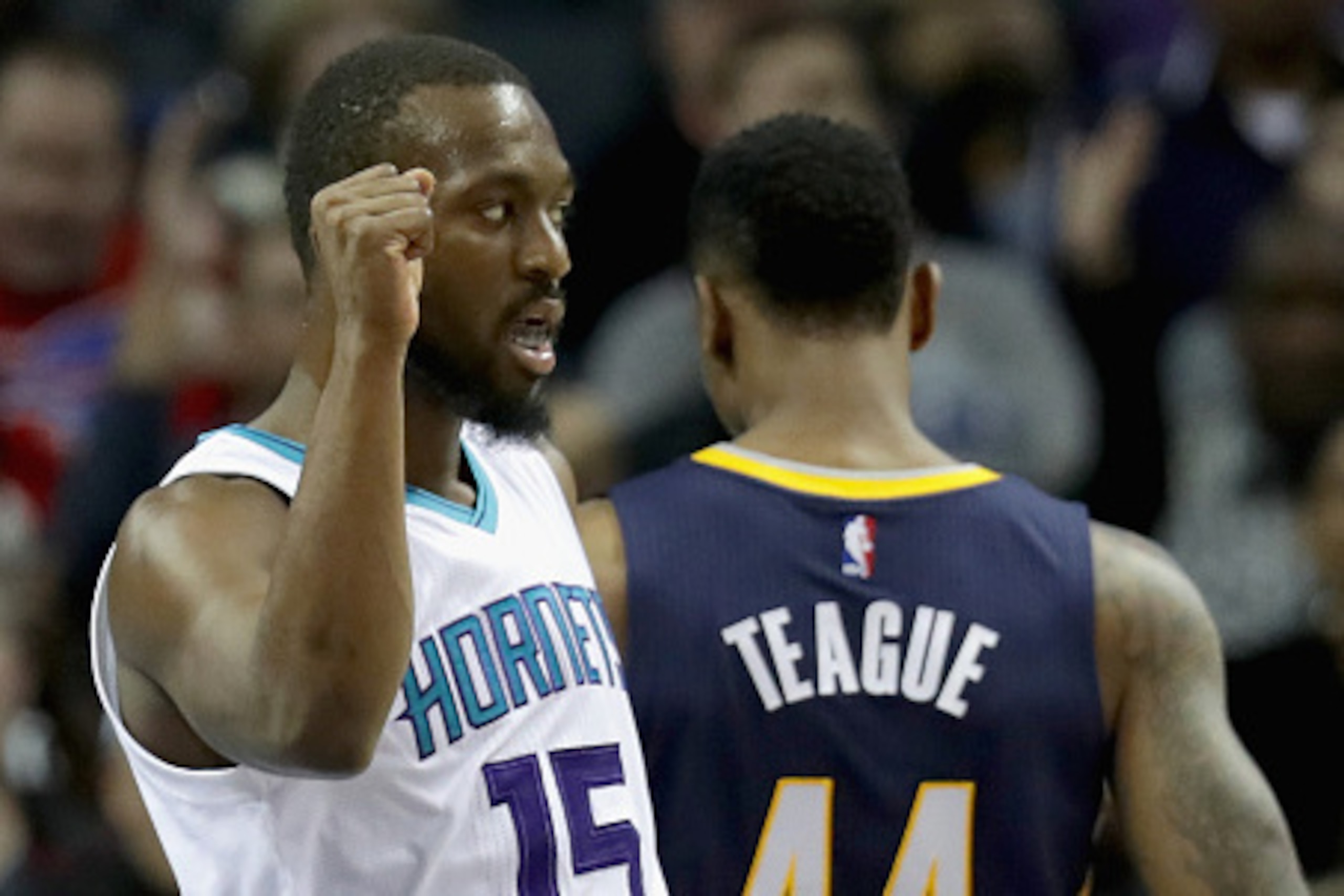 CHARLOTTE, NC - NOVEMBER 07:  Kemba Walker #15 of the Charlotte Hornets reacts after a play against Jeff Teague #44 of the Indiana Pacers during their game at Spectrum Center on November 7, 2016 in Charlotte, North Carolina. NOTE TO USER: User expressly a