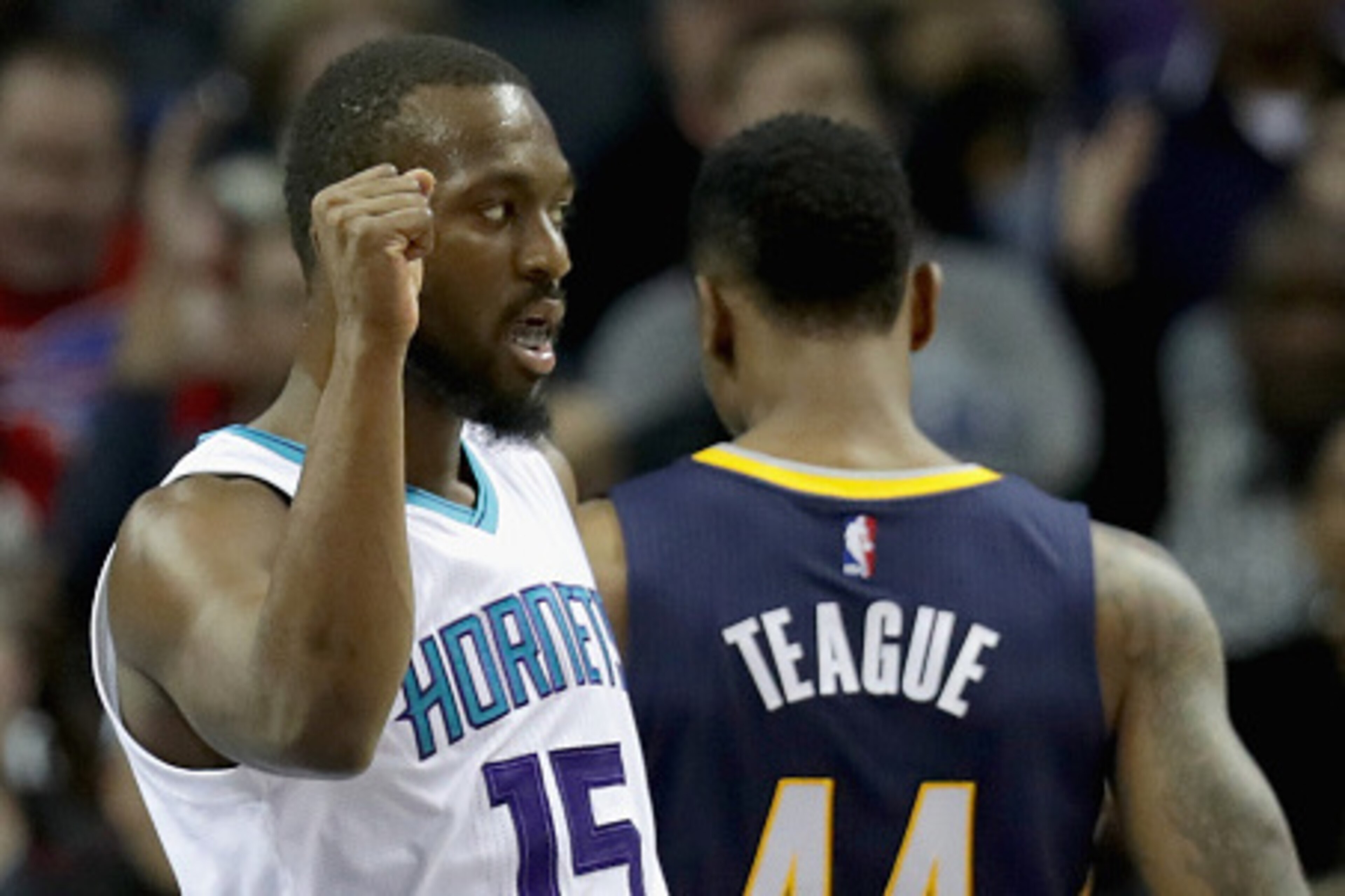 CHARLOTTE, NC - NOVEMBER 07:  Kemba Walker #15 of the Charlotte Hornets reacts after a play against Jeff Teague #44 of the Indiana Pacers during their game at Spectrum Center on November 7, 2016 in Charlotte, North Carolina. NOTE TO USER: User expressly a