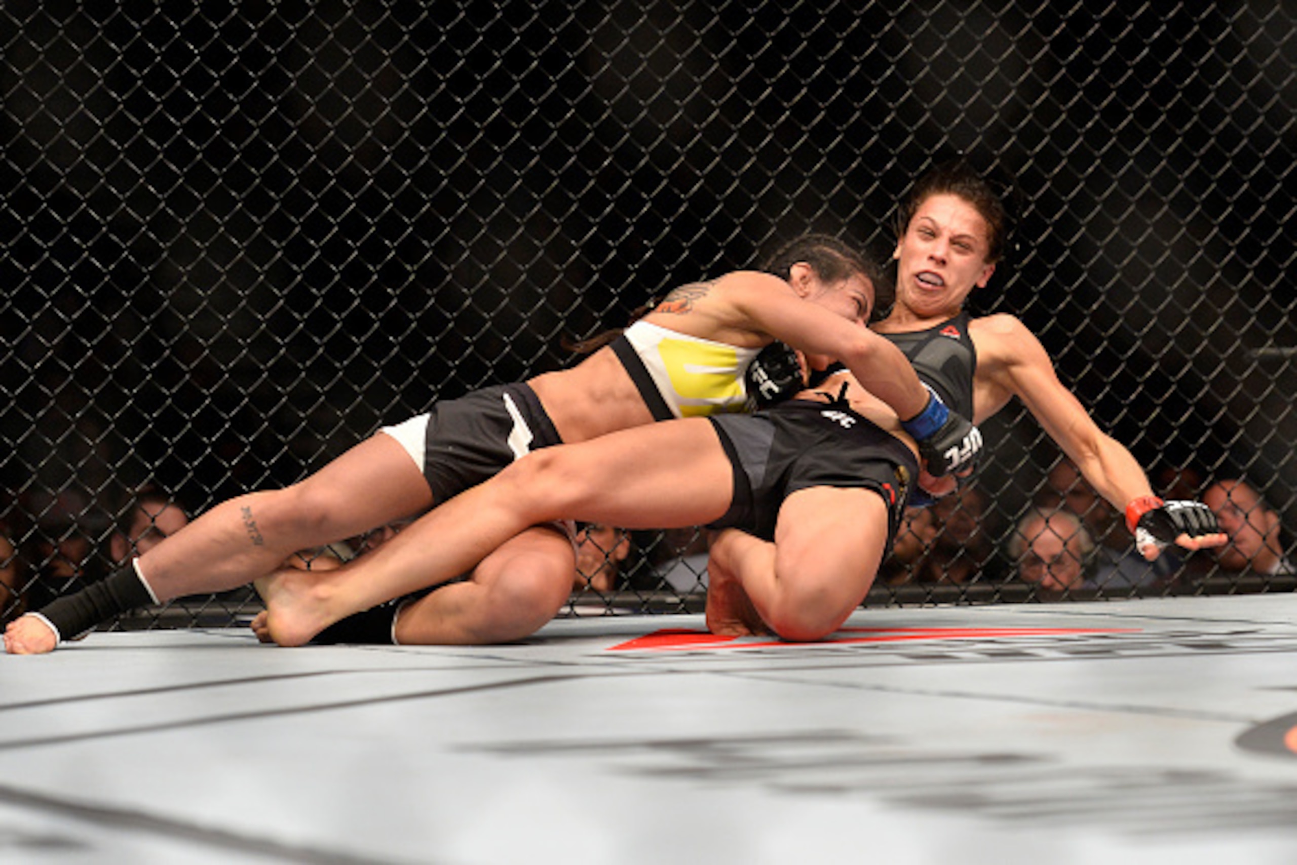 LAS VEGAS, NV - JULY 08: (L-R) Claudia Gadelha of Brazil takes down Joanna Jedrzejczyk of Poland in their women's strawweight championship bout during The Ultimate Fighter Finale event at MGM Grand Garden Arena on July 8, 2016 in Las Vegas, Nevada. (Pho LAS VEGAS, NV - JULY 08: (L-R) Claudia Gadelha of Brazil takes down Joanna Jedrzejczyk of Poland in their women's strawweight championship bout during The Ultimate Fighter Finale event at MGM Grand Garden Arena on July 8, 2016 in Las Vegas, Nevada. (Pho