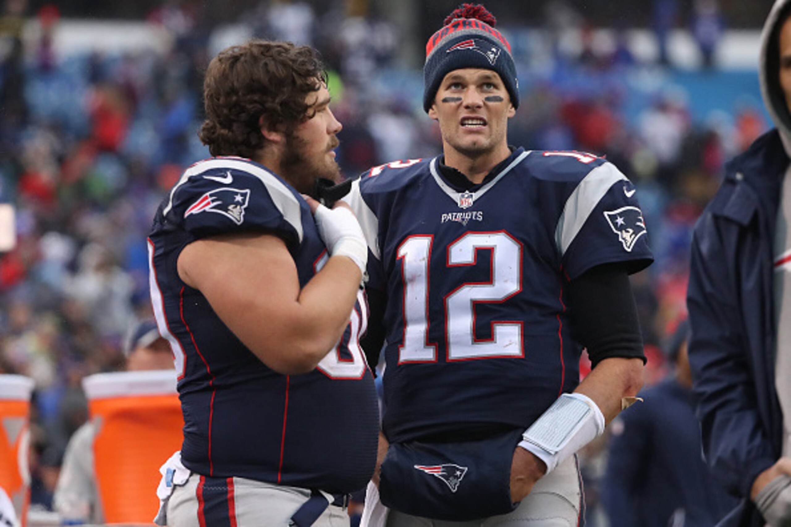 ORCHARD PARK, NY - OCTOBER 30: Tom Brady #12 of the New England Patriots talks to David Andrews #60 on the sideline during NFL game action against the Buffalo Bills at New Era Field on October 30, 2016 in Orchard Park, New York. (Photo by Tom Szczerbowski