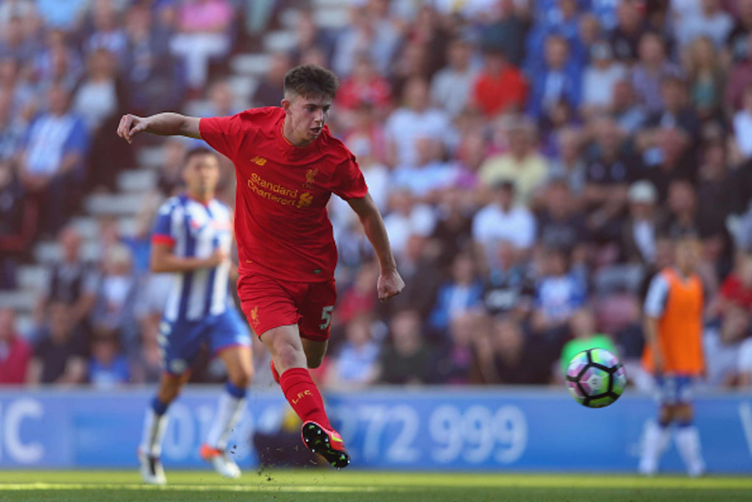 WIGAN, ENGLAND - JULY 17: Ben Woodburn of Liverpool scores the second goal during a pre-season friendly between Wigan Athletic and Liverpool at JJB Stadium on July 17, 2016 in Wigan, England. (Photo by Alex Livesey/Getty Images) WIGAN, ENGLAND - JULY 17: Ben Woodburn of Liverpool scores the second goal during a pre-season friendly between Wigan Athletic and Liverpool at JJB Stadium on July 17, 2016 in Wigan, England. (Photo by Alex Livesey/Getty Images)