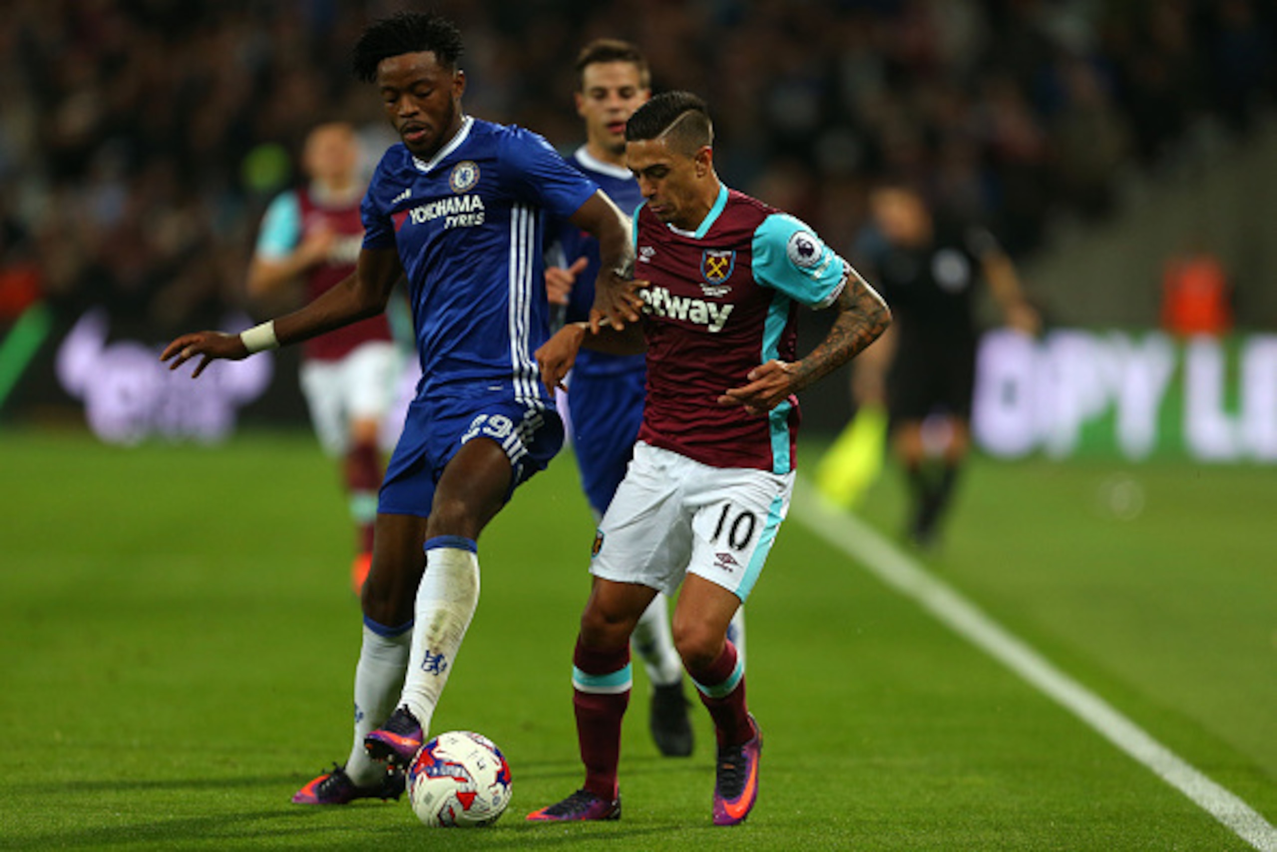 LONDON, ENGLAND - OCTOBER 26: Nathaniel Chalobah of Chelsea and Manuel Lanzini of West Ham during the EFL Cup fourth round match between West Ham and Chelsea at The London Stadium on October 26, 2016 in London, England. (Photo by Catherine Ivill - AMA/Get