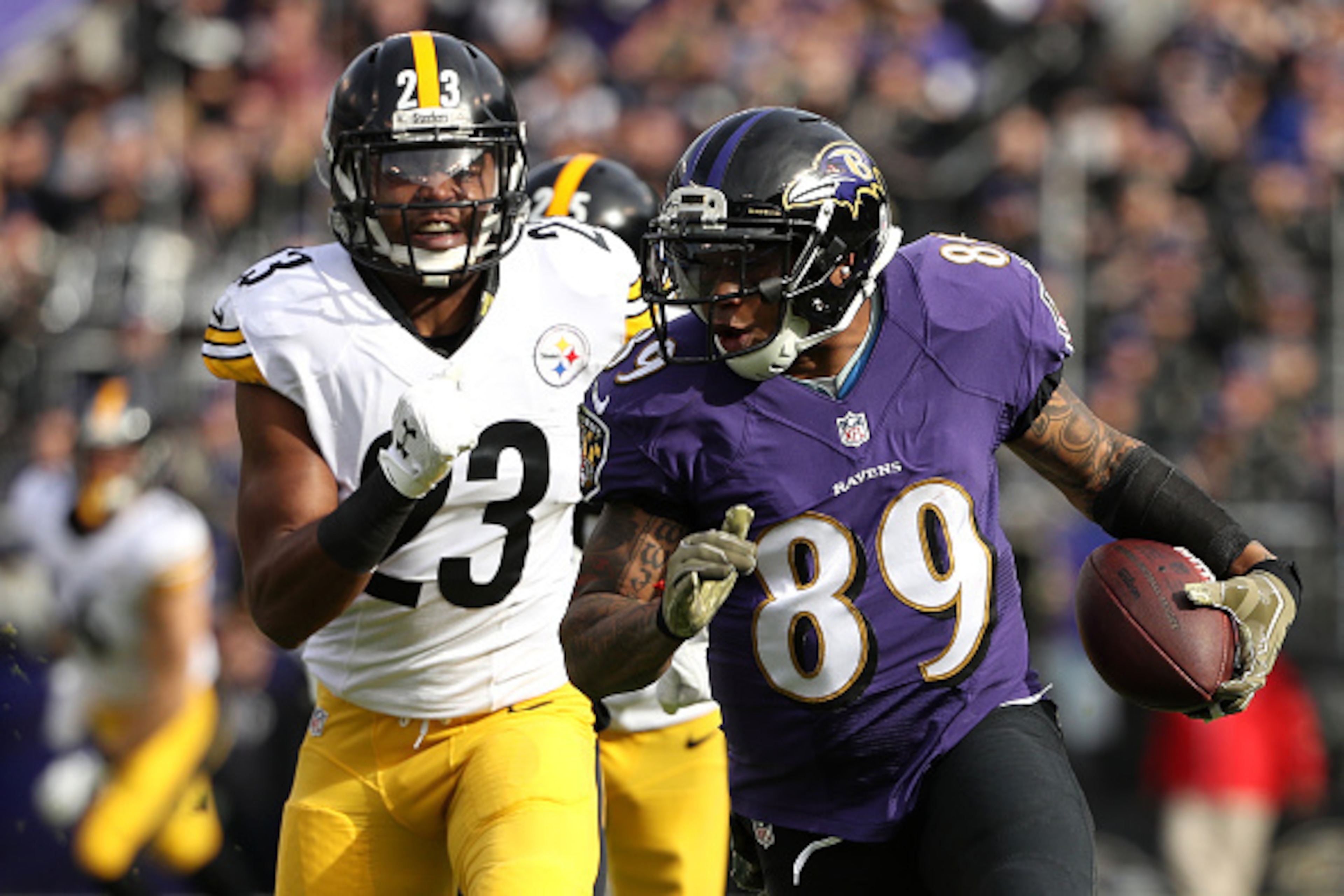 BALTIMORE, MD - NOVEMBER 6: Wide receiver Steve Smith #89 of the Baltimore Ravens carries the ball against free safety Mike Mitchell #23 of the Pittsburgh Steelers in the first quarter at M&T Bank Stadium on November 6, 2016 in Baltimore, Maryland. (Photo BALTIMORE, MD - NOVEMBER 6: Wide receiver Steve Smith #89 of the Baltimore Ravens carries the ball against free safety Mike Mitchell #23 of the Pittsburgh Steelers in the first quarter at M&T Bank Stadium on November 6, 2016 in Baltimore, Maryland. (Photo