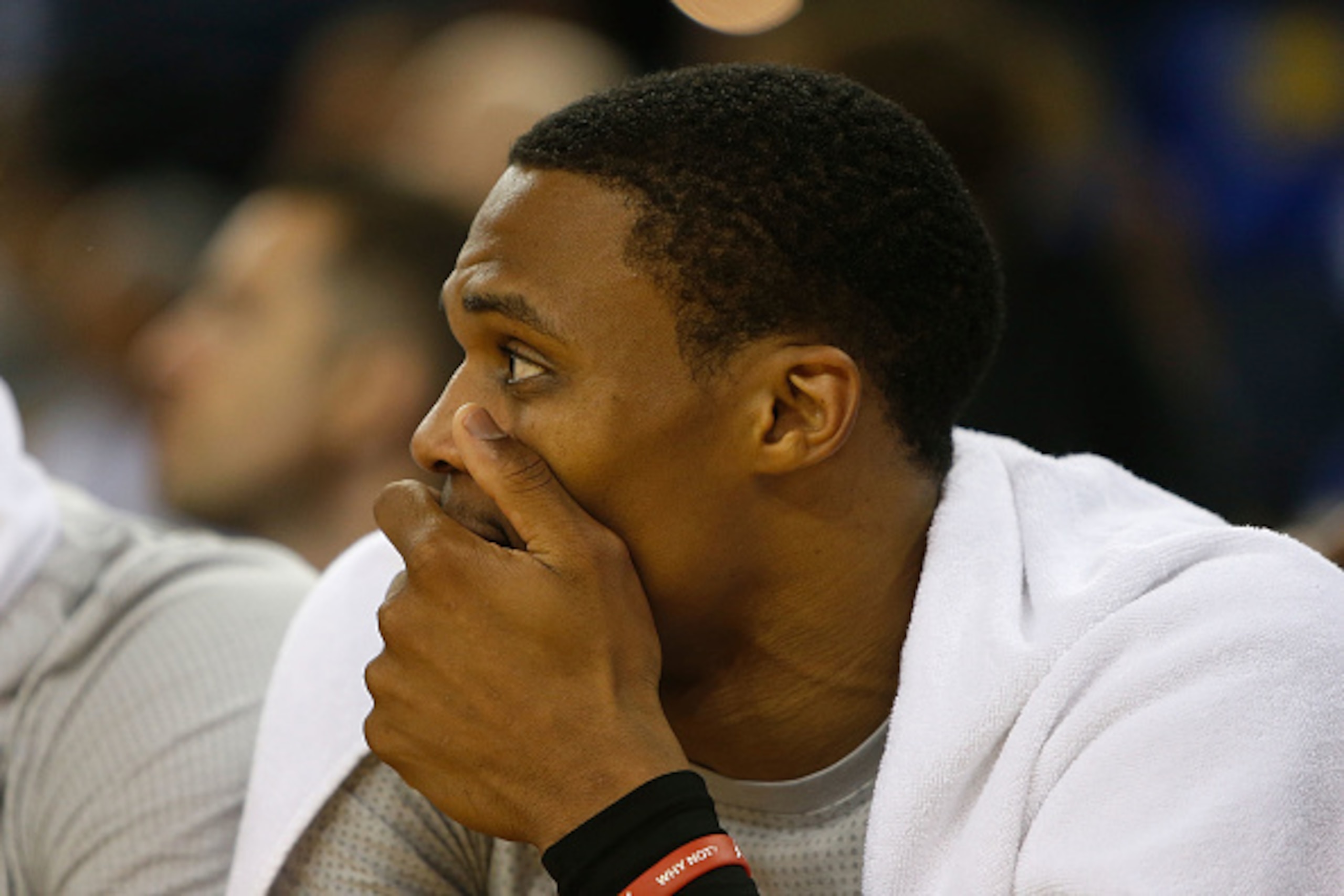 OAKLAND, CA - NOVEMBER 03: Russell Westbrook #0 of the Oklahoma City Thunder looks on from the bench in the game against the Golden State Warriors at ORACLE Arena on November 3, 2016 in Oakland, California. NOTE TO USER: User expressly acknowledges and ag