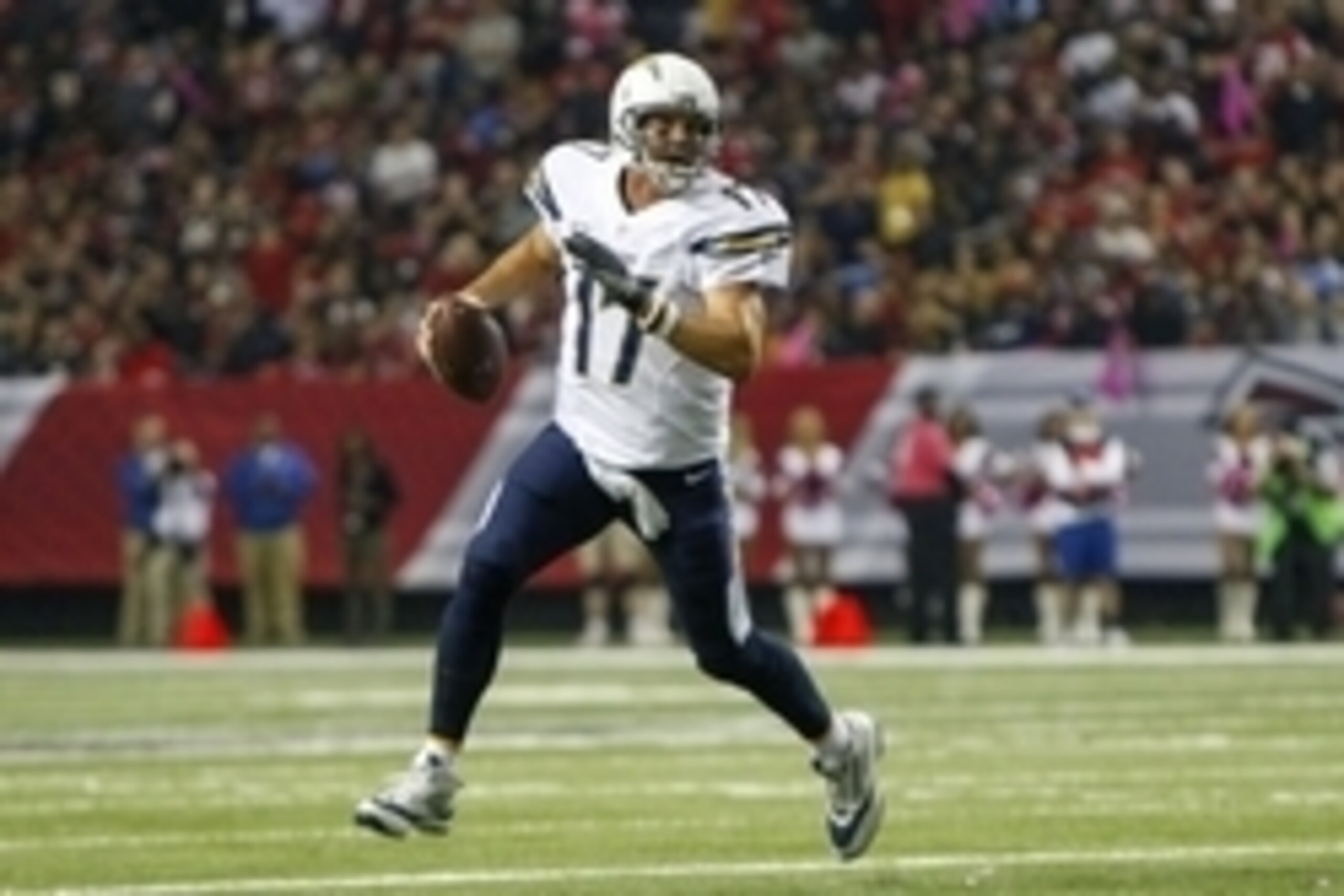 Oct 23, 2016; Atlanta, GA, USA; San Diego Chargers quarterback Philip Rivers (17) scrambles against the Atlanta Falcons in second half at the Georgia Dome. The Chargers defeated the Falcons 33-30. Mandatory Credit: Brett Davis-USA TODAY Sports