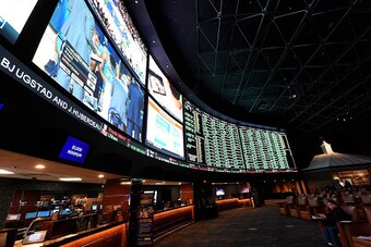 LAS VEGAS, NV - FEBRUARY 02:  The betting line and some of the nearly 400 proposition bets for Super Bowl 50 between the Carolina Panthers and the Denver Broncos are displayed at the Race & Sports SuperBook at the Westgate Las Vegas Resort & Casino on Feb