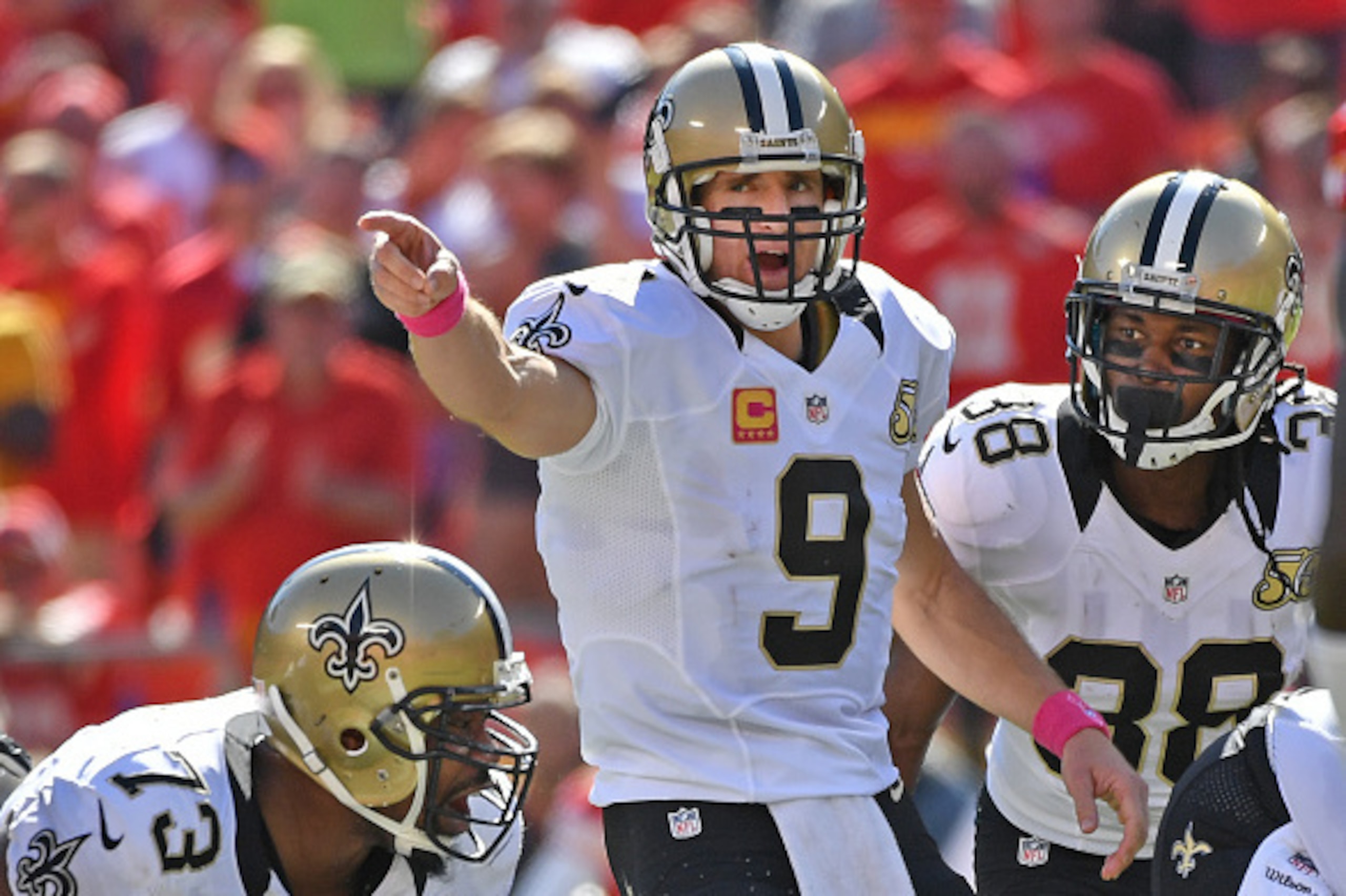 KANSAS CITY, MO - OCTOBER 23:  Quarterback Drew Brees #9 of the New Orleans Saints points out instructions against the Kansas City Chiefs during the second half on October 23, 2016 at Arrowhead Stadium in Kansas City, Missouri.  (Photo by Peter G. Aiken/G