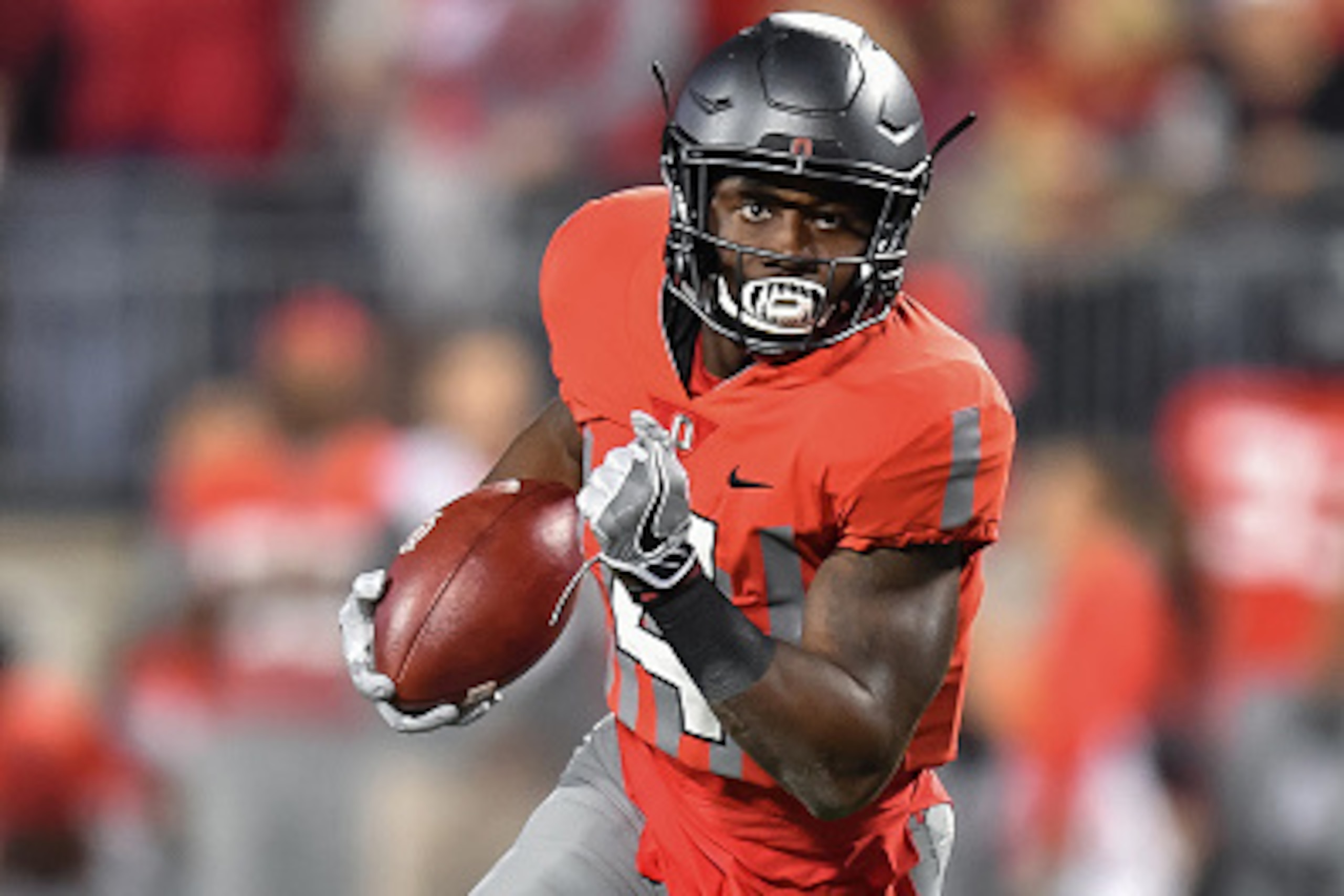 COLUMBUS, OH - NOVEMBER 5:  Curtis Samuel #4 of the Ohio State Buckeyes runs with the ball against the Nebraska Cornhuskers at Ohio Stadium on November 5, 2016 in Columbus, Ohio. Ohio State defeated Nebraska 62-3.  (Photo by Jamie Sabau/Getty Images)