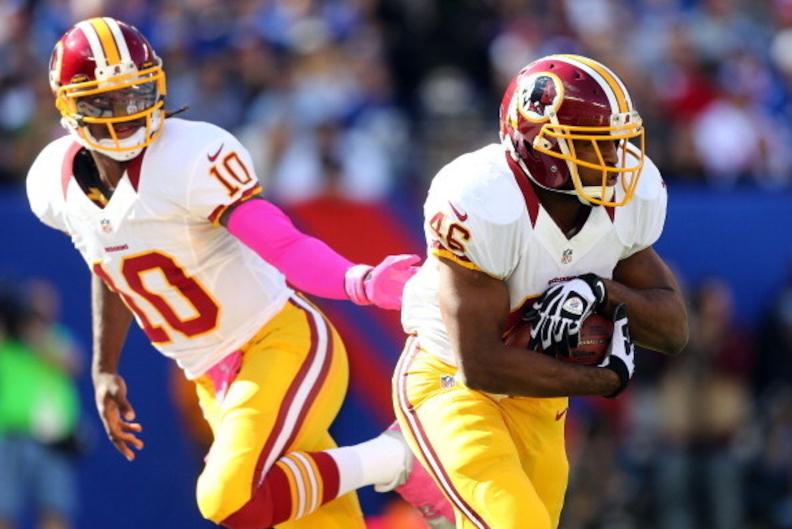EAST RUTHERFORD, NJ - OCTOBER 21:  (NEW YORK DAILIES OUT)   Robert Griffin III #10 and Alfred Morris #46 of the Washington Redskins in action against the New York Giants at MetLife Stadium on October 21, 2012 in East Rutherford, New Jersey. The Giants def