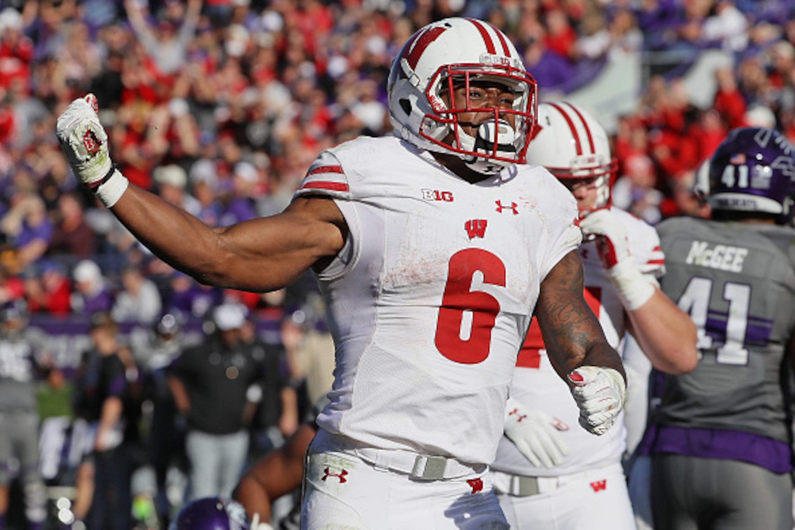EVANSTON, IL - NOVEMBER 05: Corey Clement #6 of the Wisconsin Badgers celebrates after socring a 4th quarter touchdown against the Northwestern Wildcats at Ryan Field on November 5, 2016 in Evanston, Illinois. Wisconsin defeated Northwestern 21-7. (Photo 
