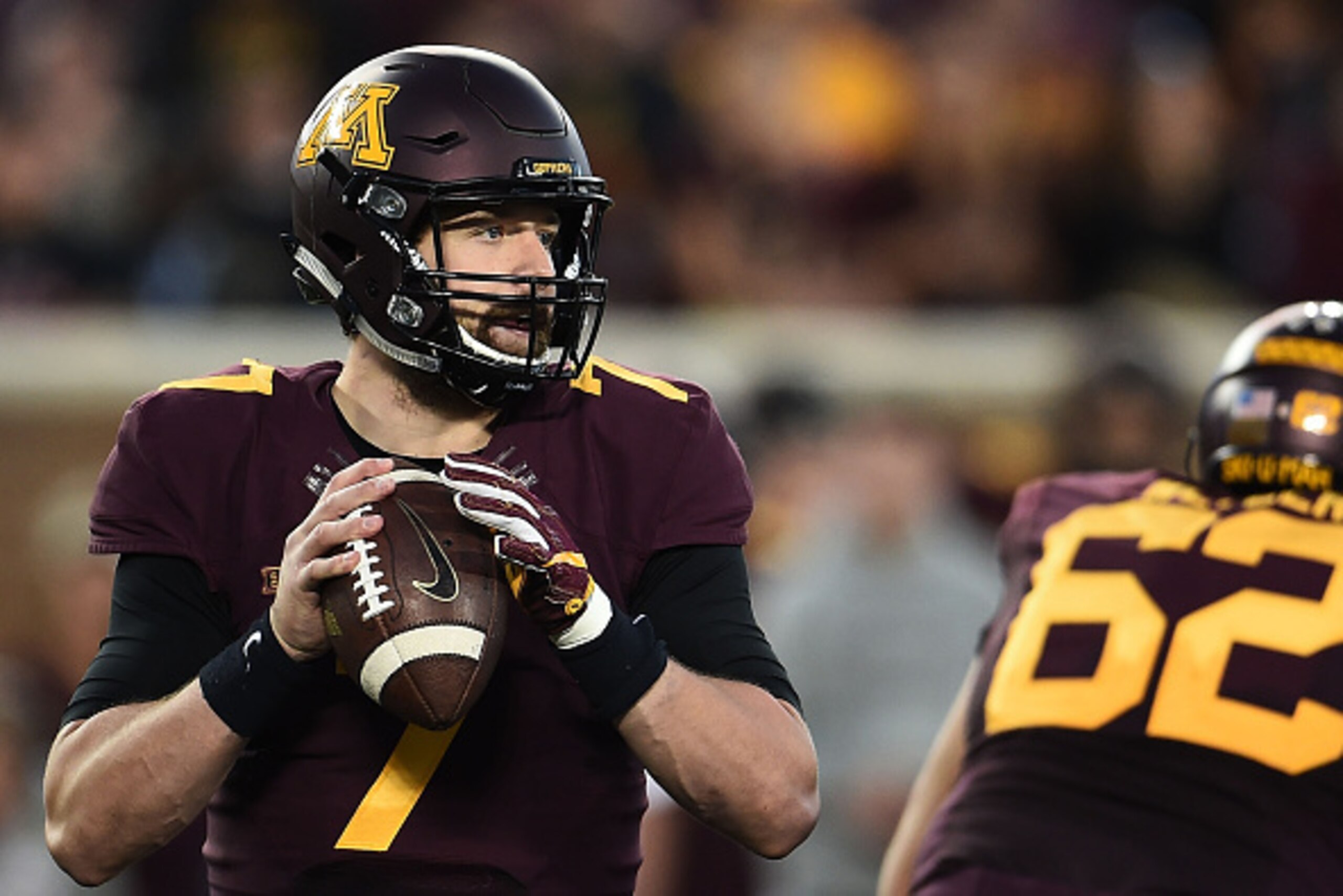 MINNEAPOLIS, MN - NOVEMBER 05:  Mitch Leidner #7 of the Minnesota Golden Gophers drops back to pass during the second half of a game against the Purdue Boilermakers at TCF Bank Stadium on November 5, 2016 in Minneapolis, Minnesota.  (Photo by Stacy Revere