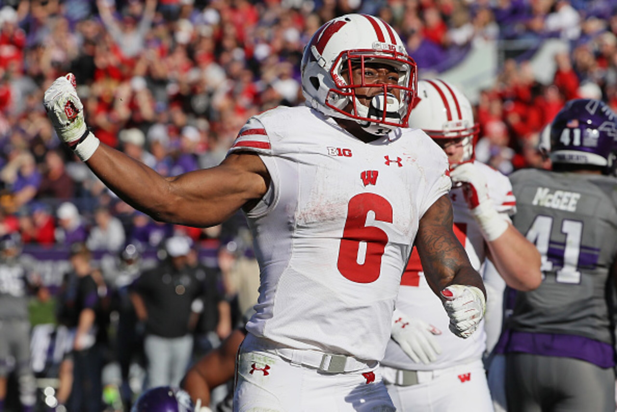 EVANSTON, IL - NOVEMBER 05: Corey Clement #6 of the Wisconsin Badgers celebrates after socring a 4th quarter touchdown against the Northwestern Wildcats at Ryan Field on November 5, 2016 in Evanston, Illinois. Wisconsin defeated Northwestern 21-7. (Photo 