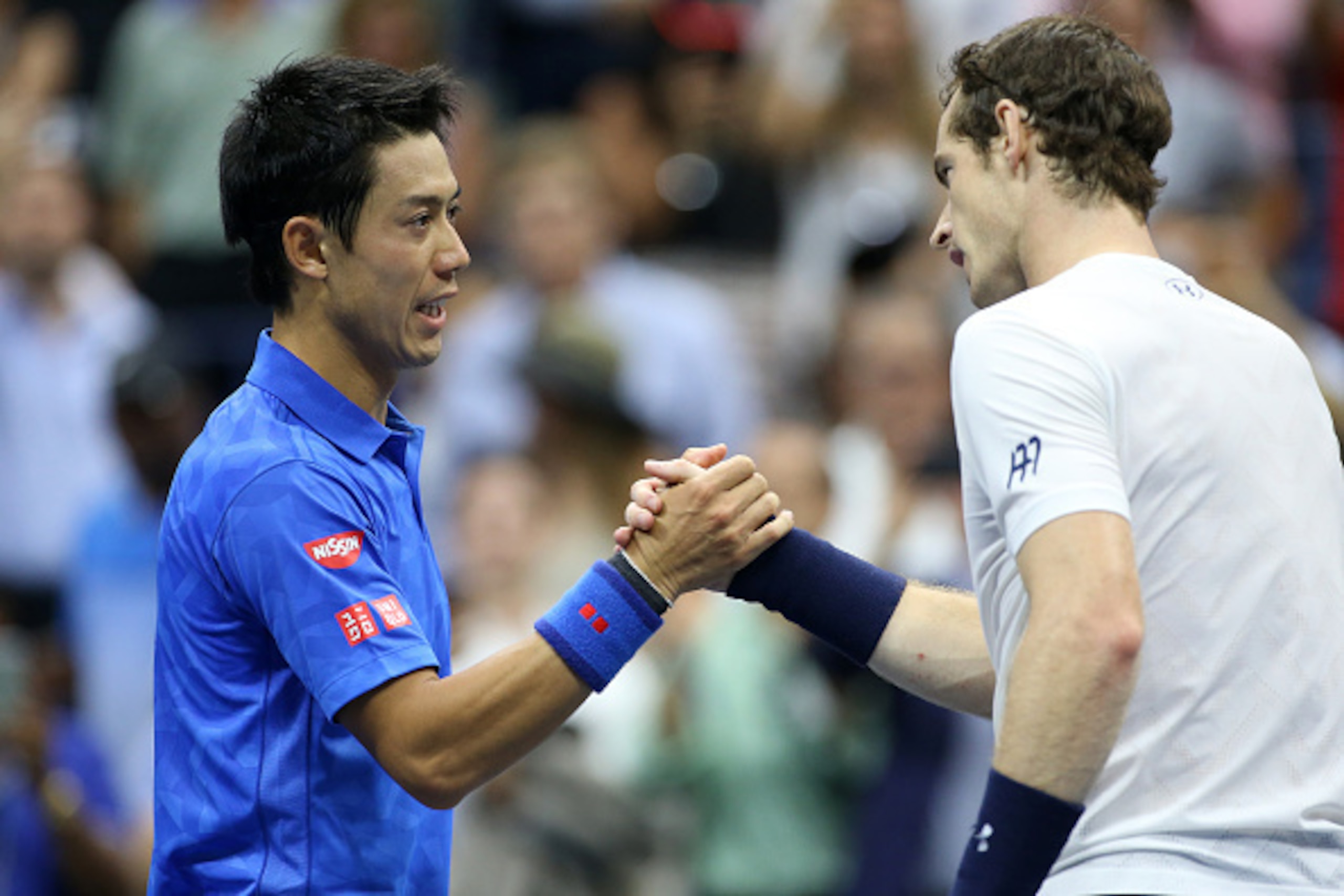 NEW YORK, NY - SEPTEMBER 7: Kei Nishikori of Japan shakes hands with Andy Murray of Great Britain after his victory on day 10 of the 2016 US Open at USTA Billie Jean King National Tennis Center on September 7, 2016 in New York City. (Photo by Jean Catuffe