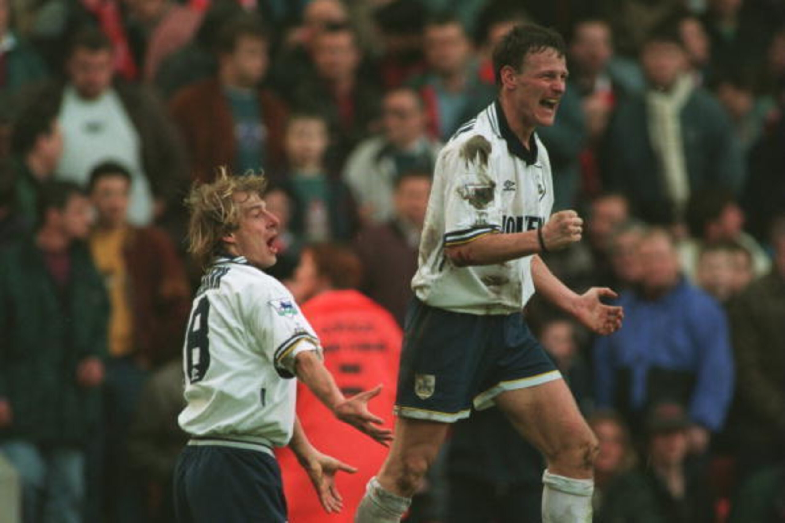 11 MAR 1995:  TEDDY SHERINGHAM OF SPURS (R) CELEBRATES  WITH TEAM MATE JURGEN KLINSMANN  AFTER KLINSMANN SCORES THE LAST MINUTE EQUALISER AGAINST LIVERPOOL IN THEIR FA CUP QUARTERFINAL MATCH AT ANFIELD, LIVERPOOL. Mandatory Credit: Clive Brunskill/ALLSPOR